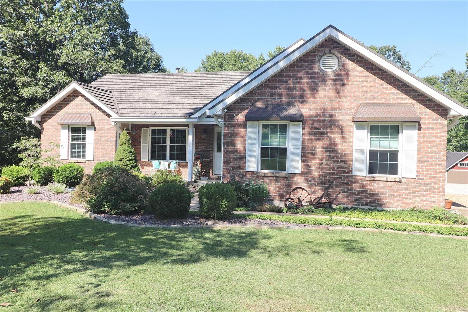 When only the best will do!  Beautiful curb appeal welcomes you to this 3 bedroom, 3 bath brick home on a little over 2 acres, located at the end of the street.  Long concrete driveway turns into the 2 car garage with epoxy coated flooring.  Newer Decra shaker roof, (2017) has 50 year one time transferrable warranty. Newer furnace & A/C (2020), appliances (2015), some newer flooring (2015), newer hot water heater (2018).  Spacious composite deck overlooks large back yard, above ground pool & hot tub.  14X30 shed with copper roof.  50 amp RV setup with 110 outlet in driveway.  Great room has a lovely gas fireplace.  Outstanding kitchen with crown molding, 2 pantries & more. Master suite has luxury bathroom with 6 jet shower stall, walk in closet with custom organizer and more.  Walk out lower level has a family room, rec room, bathroom, a 16X14 sleeping area, and more.   Beautifully landscaped yard; private setting.  Property backs to Conservation Club property.