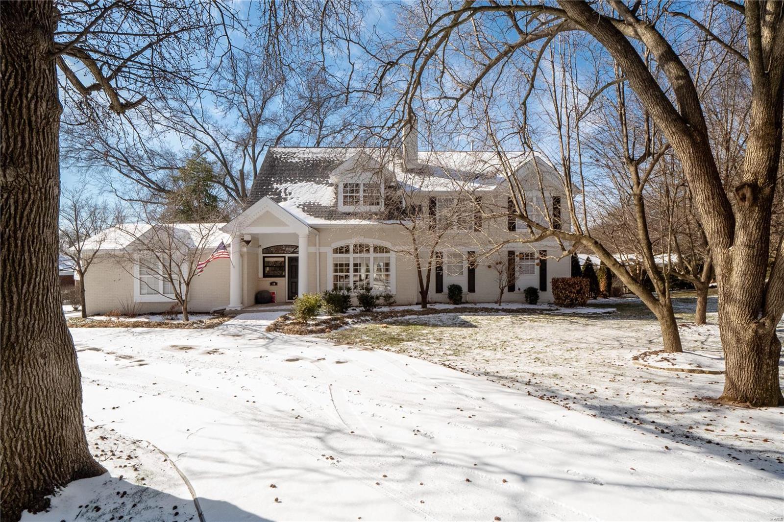 This sophisticated 4 bed, 4 bth home in Ladue schools, Reed Elementary,  has been impeccably updated! This home is accented by a stunning pool (PoolTron 2020), expansive deck and a picturesque screened-in porch.  The living room features vaulted ceilings and  a gorgeous fire place focal wall that expands to ceiling height. This pristine kitchen was updated in 2022, with custom cabinets, gas range and a beautiful island. Main level laundry is conveniently located next to the first level, primary, updated en suite with a walk in closet. Upstairs you will find 3 bedrooms, an updated full bath and loft area perfect for an office or playroom. In the lower level enjoy a rec/family room, ½ bath, workout area and storage. Bonus- new concrete driveway and epoxied garage floor. Wonderful opportunity to own a sophisticated,  move-in home with a fantastic location and newer pool!