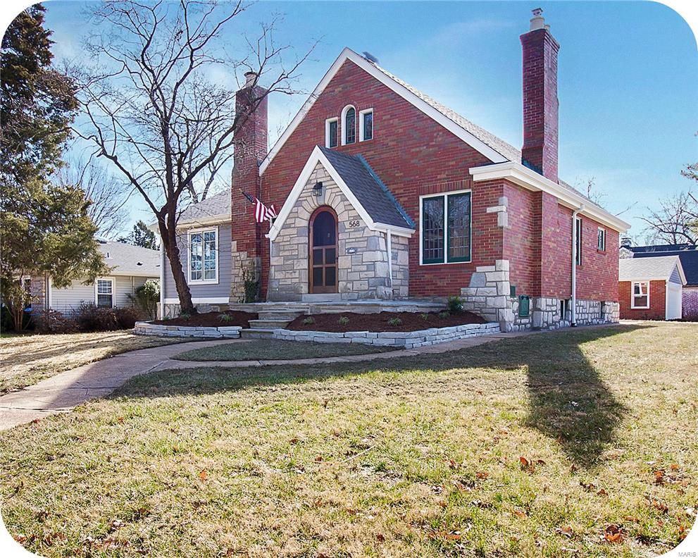 Meticulously constructed in 1936, this charming WEBSTER GROVE GINGERBREAD has been lovingly renovated & updated for today's lifestyle. New addition adds a spacious MAIN FLOOR MASTER RETREAT with lots of windows, EN SUITE BATH with double sinks & walk-in closet + another main floor bedroom. TOP SHELF KITCHEN with sparkling quartz tops, center island & attached family room so the chef of your house never feels cut off from the party. New deck off the kitchen that overlooks the big back yard; perfect for dining al fresco this spring! Spacious living room & formal dining room with VINTAGE STAINED GLASS glass & fireplace original to the home. Updated main floor bath. Upstairs you'll find two more bedrooms & a third full bath. Many more perks await your discovery such as zoned HVAC systems, new roof & 2 car garage. Charming historic jewel in the unbeatable community of Webster Groves; check it out!