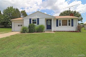 Great starter home features hardwood and ceramic tile floors, attached garage, full basement and extra large lot.  Eat-in kitchen has lots of cabinets and trendy black & white tile floor.  Two full baths, one on the main level and one in the full basement.  Large side lot for that vegetable garden or play space.  Recent upgrades include roof, water heater and windows.