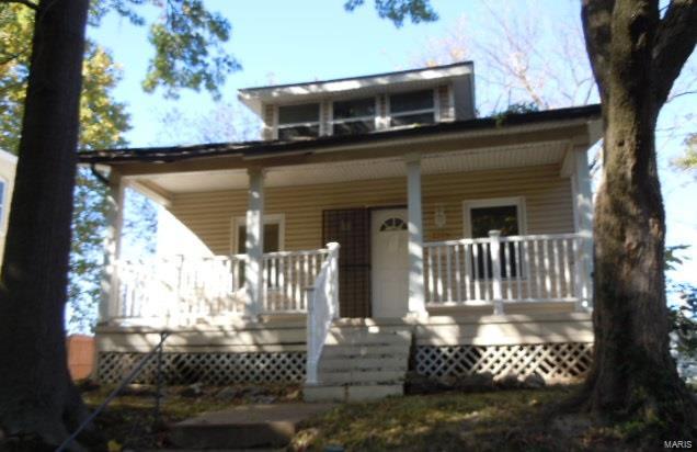 Centrally located home with vinyl siding, covered front and rear porch! Some updates to the kitchen cabinets, gas range and dishwasher. Vinyl siding on the exterior, some replacement windows. The house needs repairs but has potential!

See agent remarks for submitting offers. SpecialListingConditions: Foreclosure