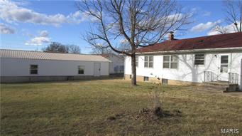 H1916 Nice 2-3 bedroom ranch on a full basement. arched doorways, large living room and entry hall. knotty pine paneled office/3rd bedroom with shelves. there is an attached one car garage and a detached outbuilding for 2 cars and a work shop. The full basement offers an additional bath and canning kitchen.  This is a Fannie Mae Homepath Property SpecialListingConditions: Foreclosure
