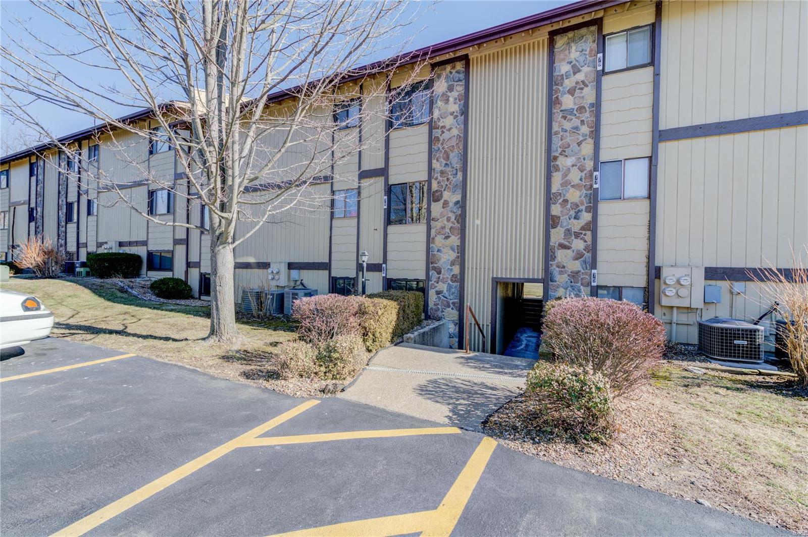 Move-in-ready 2 bed, 2 bath condo in Lake Saint Louis, with all the amenities offered to community members! Clubhouse, golf course, tennis courts, beach or swimming pool(s), lake and marina access. Or if you prefer the smaller water, take advantage of the condo pool, open to residents. Some of the many updates include New HVAC ('22), Range ('22), tub/shower ('21), and in-unit washer/dryer ('20, staying with the unit). Step into the oversized living space (formerly a 3rd bedroom) that leads to the dine-in kitchen (fridge and microwave also stay). Down the hall on the left, the main bathroom features a new tub and shower ('21). At the end of the hall you'll find the second bedroom across from the larger master bedroom, with private full bathroom. Perfect opportunity to own the lake lifestyle without responsibilities for the exterior! Location: Ground Level, Interior Unit