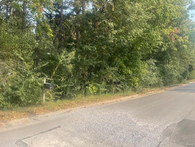 $29,500.00 N of West Maud Poplar Bluff MO 63901;  Residential undeveloped lot in great location!  This .72 acre M/L lot is wooded and has all city utilities available.  Lot is 135x188 slightly irregular shaped, and located near shopping, restaurants and more all within close proximity!