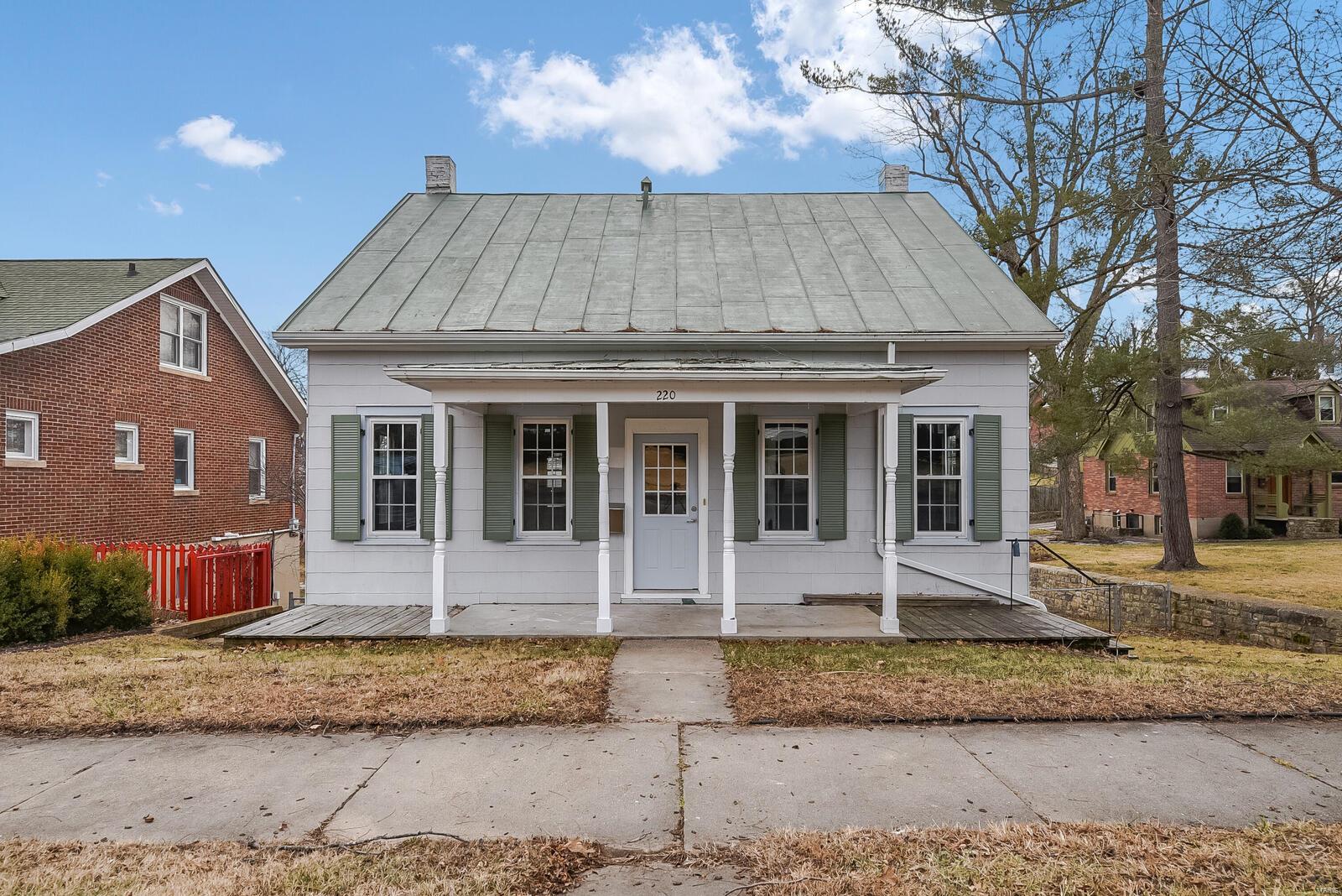 This charming 1 1/2 story home built in approx yr of 1920 is located in the heart of Hermann MO. The home features on the main level updated kitchen with center island, laminate flooring, recessed can lighting, white cabinets and cabinet pantry. (kitchen appliances will stay). Separate dining room with wood floors. Living room with wood floors, Office room or possible bedroom/sleeping area and full bath. Upper level finds you Master bedroom with very large closet and additional bedroom. Full bath, shower only. Lower level offers 1 bedroom, family/recreation room and nice cedar closet/ storage/laundry area. Huge double deck off the back of home, great for sitting and relaxing reading your favorite book or sipping on your desired beverage. Large level lot, fantastic back yard with utility shed, partial fenced on 3 sides and retaining wall on 1 side. Alley access for parking or off-street. Must See!