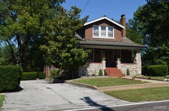 Welcome to this beautifully renovated 5 bedroom, 2 bath 1 1/2 story home in Oakville! This ‘Pinterest’ style 1925 home was originally owned by the Winheim family, who owned many acres (back in days) off Yaeger Rd.! This home is full of character & offers 9’ ceilings, hardwood floors & a multitude of closets! There is ceramic tile flooring in the kitchen, breakfast, baths & sitting rooms! The kitchen hosts a center island, lots of cabinets (large spice cabinet) & countertop space! Access to the large brick patio can be found through the breakfast room which hosts two walls of windows (as well as the adjoining sitting room)! The master bedroom & two other bedrooms are upstairs with the other two remaining bedrooms on the main level! The basement is ready for your own finishings & includes a laundry room, walk-out & access to the garage! Don’t miss this amazing home which sits on almost a half (level) acre with many updates & easy access to highways, shopping & restaurants! Welcome Home!