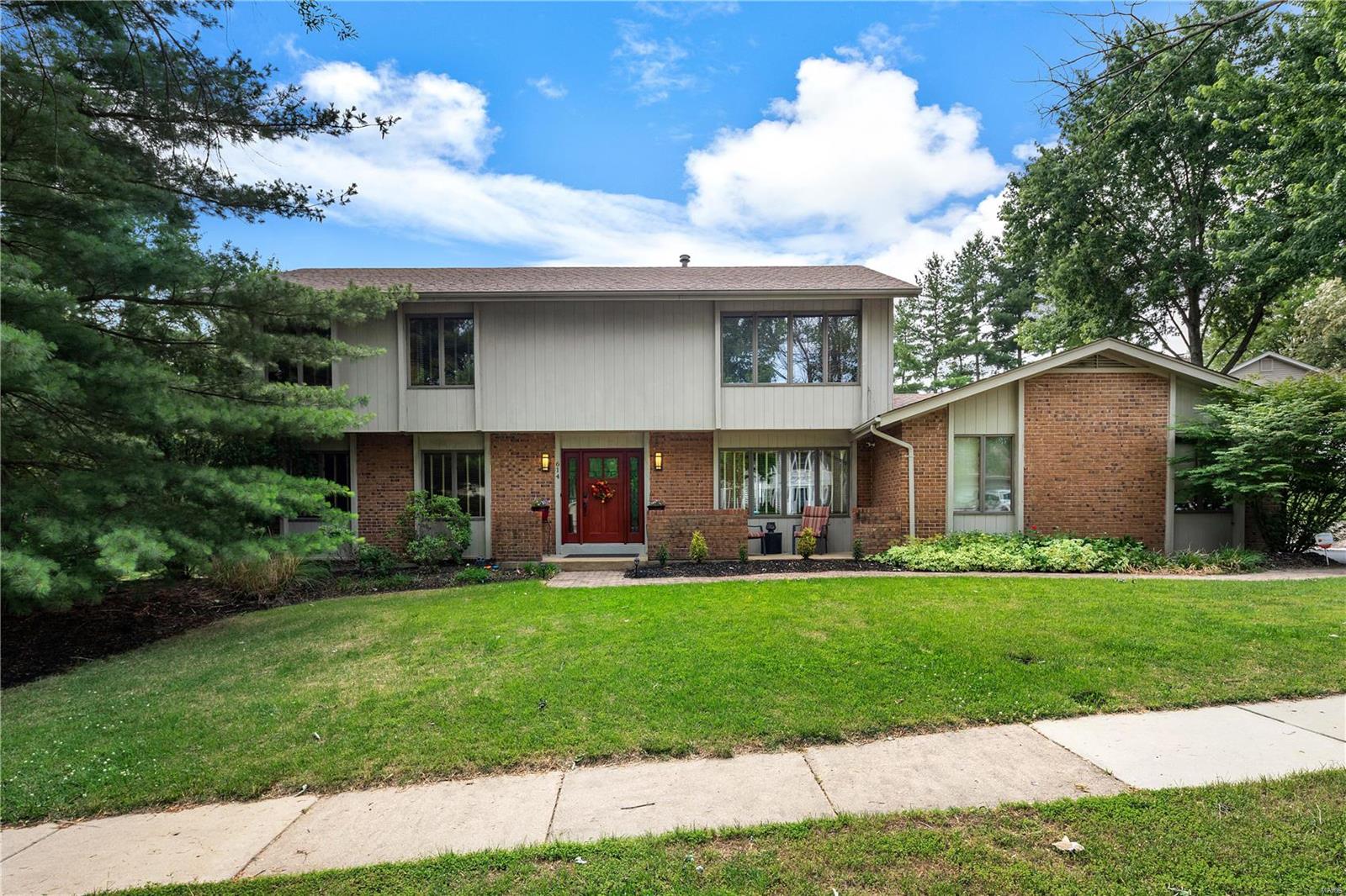 Welcome home to comfortable living in this spacious 2-story home complemented by a large private back yard for your enjoyment. Upon entering, you will find expansive rooms that offer three living spaces, including living & great rooms on the main level and a family room in the lower level. The great room features soaring vaulted ceiling, loft and fireplace. The large separate dining room is perfect for entertaining and is located off of the eat-in kitchen with extensive custom cabinetry, center island/bar, atrium window and all appliances. 4 spacious bedrooms and 3 baths (2 ensuite) are offered on the upper level. The partially finished lower level provides potential 'mother-in-law' quarters or 5th bedroom (meets criteria except for window size), with small kitchenette area and ensuite bath. The asphalt driveway leads to the rear entry garage with a very sizable area to play basketball, maneuver vehicles or host a party!