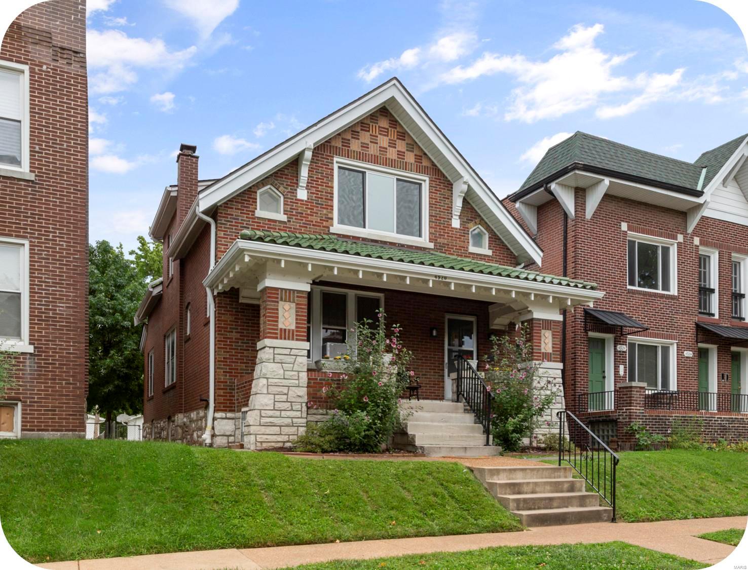 Welcome to this jaw-dropping eclectic bungalow in Princeton Heights with new solar panels! From the moment you walk in the front foyer you will notice how wide open and airy the floor plan feels. The home lives large. Plenty of original architecture and stained glass windows. The kitchen is truly one of a kind; featuring WoodHarbor custom cabinets made of Knotty Alder w/ a walnut stain, open face floating shelving, navy ceramic tile back splash, & granite countertops. Enjoy Fisher Paykel stainless dishwasher, Summit stainless refrigerator, and stainless gas stove in the built in island. Three roomy bedrooms upstairs with a balcony perched over the spacious back yard. Abundance of garage space with a unique twin door detached garage. Just a short walk to Onesto Pizza & Trattoria, easy bike ride to Macklind District's restaurants/shops. Recently Updated 2nd floor bathroom 2021, Solar panels 2021, new radiator installed Dec 2020, and new Fuse box and electric service.
