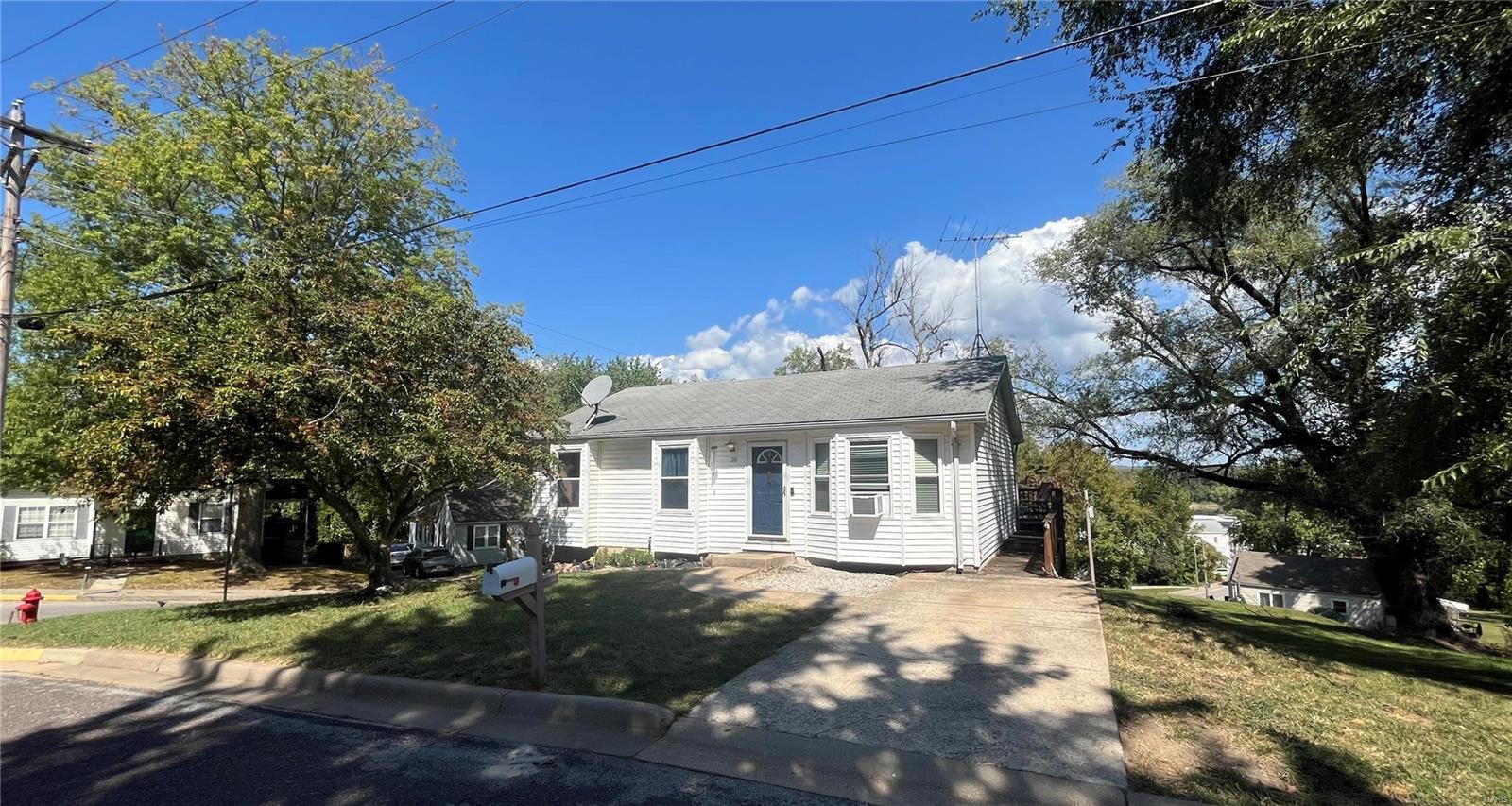 Looking for a small ranch style home with walkout basement that's not far from the Missouri River boat ramp? Here it is! This will be an easy move and easy choice to call it home. All the bedrooms are on the main floor with a blank slate to imagine what you would do with a full, partially finished, walkout basement. You'll enjoy not having to mow a big yard and getting to kick back to enjoy that morning cup of coffee or grill on your deck just off the kitchen/dining area, then it's an easy retreat back inside through the sliding glass door. Want to take a short stroll to shops, dining, movie theater, distillery, brewery and riverwalk? Check those off the list! Top Notch New Haven schools are just up the hill and it is definitely not uphill both ways. New Haven may seem like forever away from Big City living and it almost is, but you can be back in the bustle in no time if you need to commute and what a great way to be able to step back into small town living when you come home.