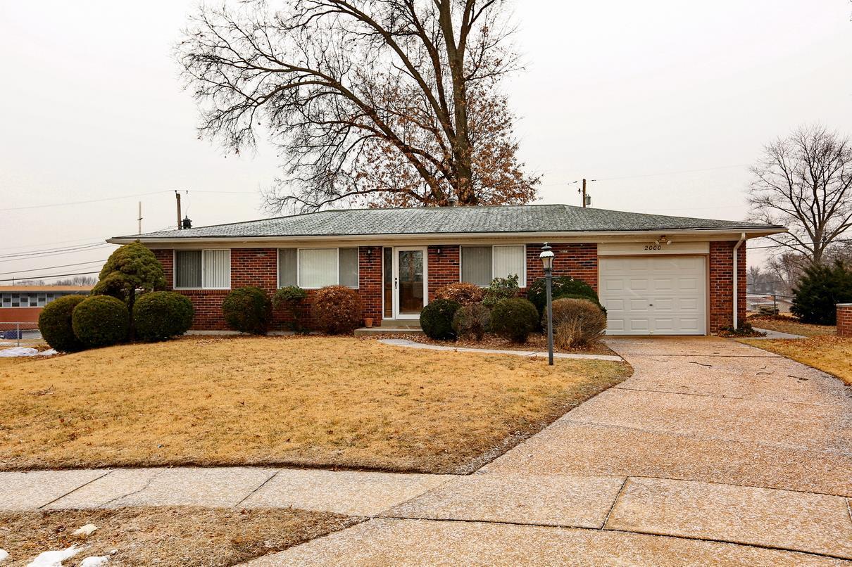 Full brick ranch home in Hazelwood West! Main level freshly painted w/professionally cleaned carpets, & new carpet in lower level. Gorgeous solid wood entry door w/leaded glass & sidelight. Main level boast large living & dining rooms, 3 bedrooms & 1.5 baths. Dine in kitchen features ceiling fan, garage & back yard access. Master has a private half bath, full hall bath updated w/pedestal sink. Lower level has as full bath, open finish for rec & family areas, bonus room, storage & laundry area. Huge back yard is level & fully fenced, covered patio accessed from kitchen & service door to garage. Additional features include thermal windows w/marble sills, ceiling fans, whole house fan, & 200 amp elec service. Central vac, washer, dryer, air cleaner, humidifier & refrigerator included in their current condition. This home is walking distance to both public & private elementary schools, close to all services & main roadways. City of Florissant amenities, water park is just short walk away!