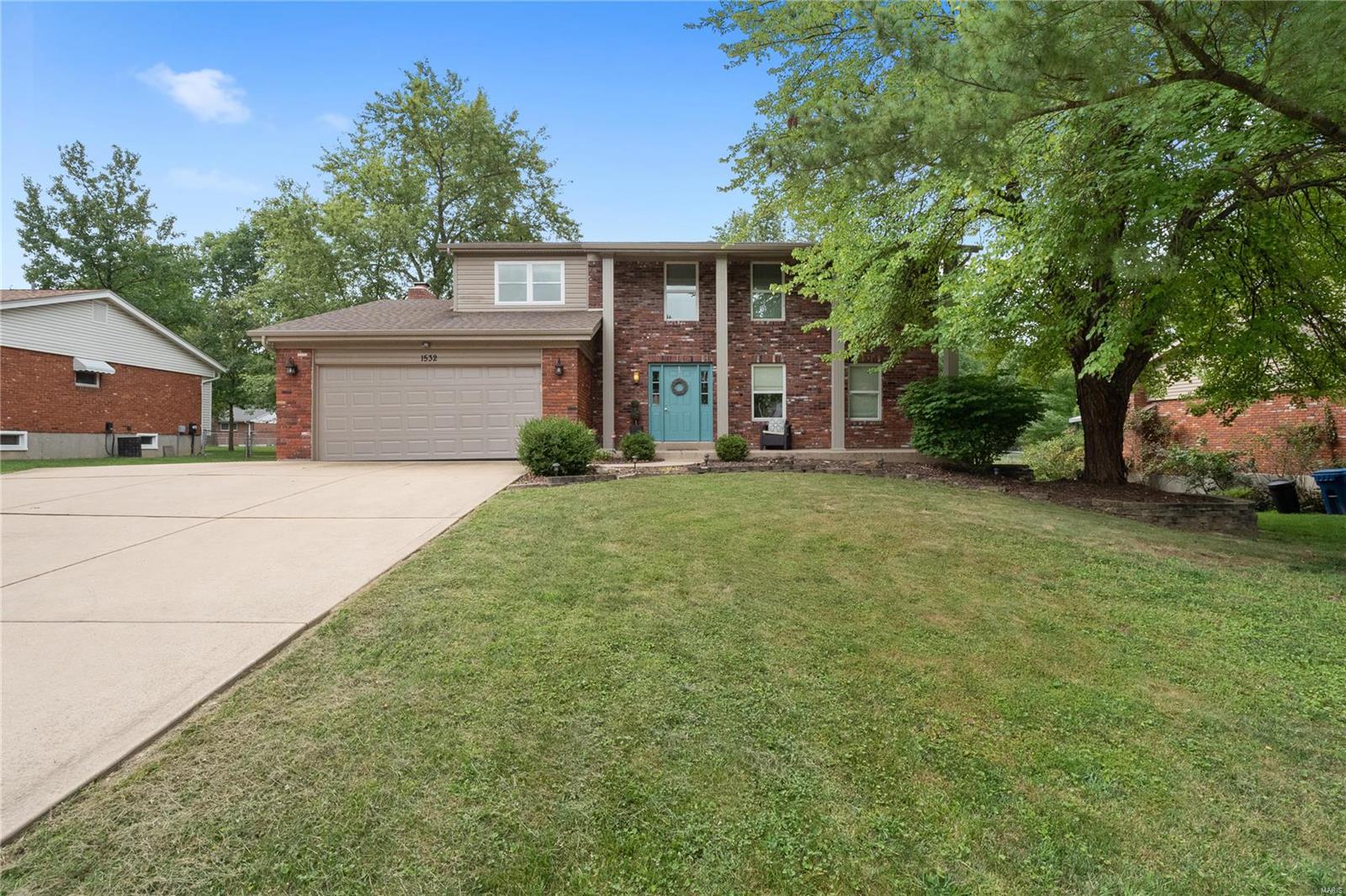 A Treasure Chest of Charm! This lovingly maintained 2 story rests on a quiet tree-lined street in award-winning Rockwood School District. This floor plan offers room for everyone & everything with 4beds/4baths and over 3200 fin SF!  Well-designed for entertaining while keeping the family in mind & decorated oh so cute! The sun-filled kitchen is sure to fry the competition with granite counters, custom cabs, SS appliances & cheerful bayed brkst rm. Family room exudes coziness with beamed ceiling, w/b fireplace & French door access to patio overlooking an amazingly large and private yard. Separate living & dining rm eagerly await more formal entertaining! Romantic master ste with WIC and updated bath. Walk-out LL is the center for family fun complete with rec room, game room with wet bar, den/media area & half bath! Walk out to an awesome park-like yard with multi-level patio & your very own fire-pit. Hardwood floors, Hi-Effic HVAC & so more. What's not to love? Be the new proud owner!