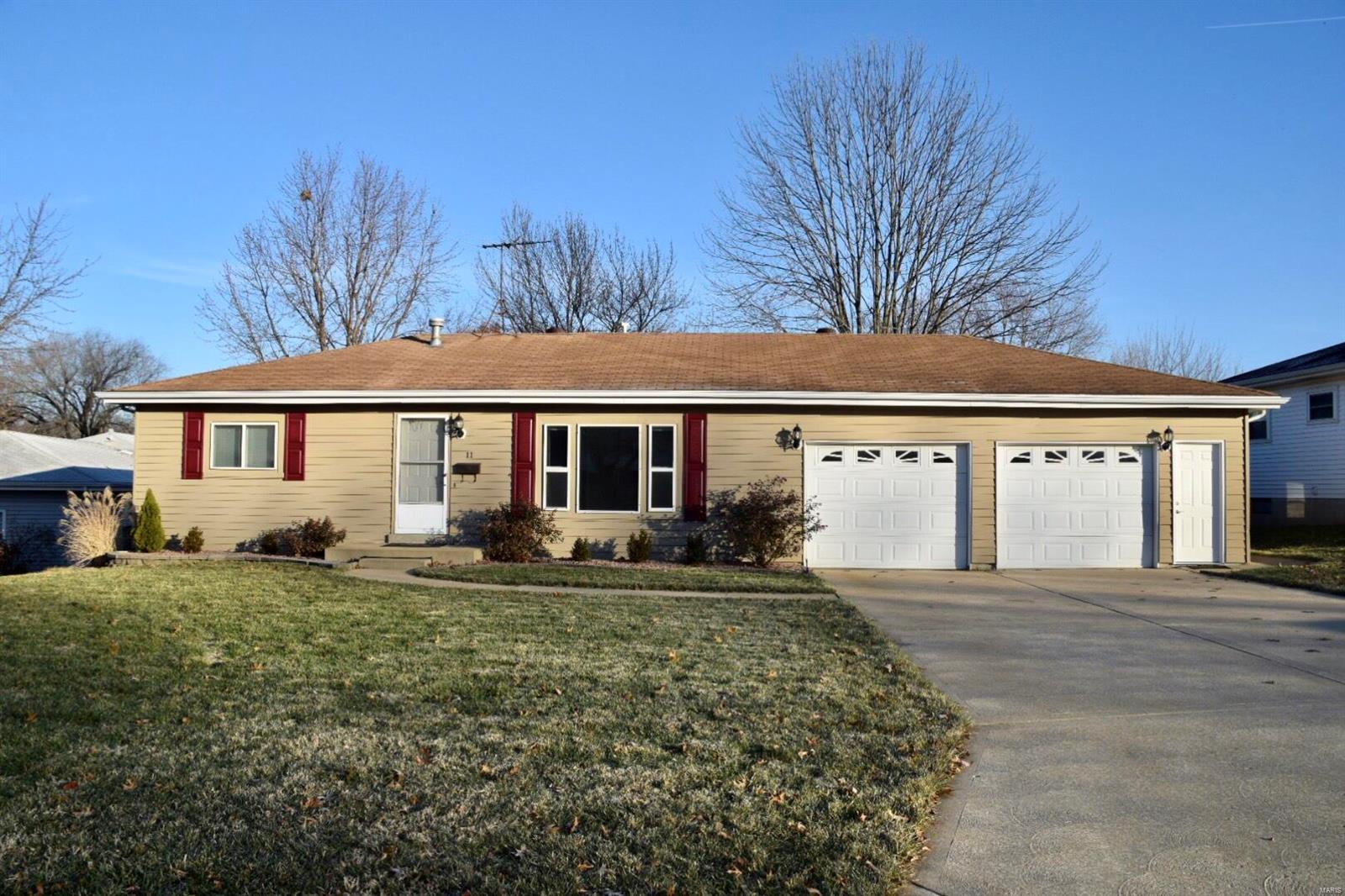 Talk about a perfect location!! This 3 bedroom, 3 bathroom ranch with 2 car garage is a great space. Large kitchen with wrap around counter creates plenty of space to cook and entertain. Wood throughout most of main level and nice size bedrooms. Master suite has beautifully redone bathroom with stand up shower and double sinks. Work bench/craft space off of garage and a nice flat fenced in back yard. Shed is empty and can be used as additional storage. Basement is finished with living space and additional counter space with a sink. Quick access to new service road and I-70. No smoking, pet may be considered with a $50/mo pet rent and $300 deposit. Minimum 24 month lease. $50 application fee per adult on lease.