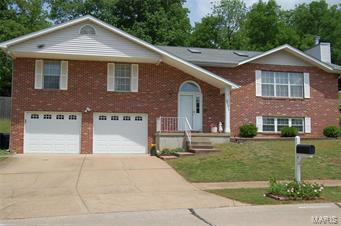 This is a great FAMILY home with lots of space-over 2600 sq ft of finished area! One of the largest 3 BR/3B in Arnold and a half acre private lot with an oversized 2 car garage. A large entry foyer invites you into the huge family room with wood burning fireplace or into the upper great room with overhead skylights.  There is a large separate dining room with bay window.  Kitchen offers lots of cabinets and storage, breakfast bar, and breakfast room that walks out onto a huge deck complete with a koi pond and waterfall.  This home features a vaulted master suite with master bath & Jacuzzi style tub and 2 more large bedrooms and bath with skylight.  LL features another full bath, bonus room, and laundry with a wet sink.  Back yard also includes fencing and backs to woods that on this half acre lot. Lots of options - 2 yr old roof/ solid wood doors & trim/ vaulted ceilings / skylights! 
Easy access to highways, restaurants, and lots of shopping.
