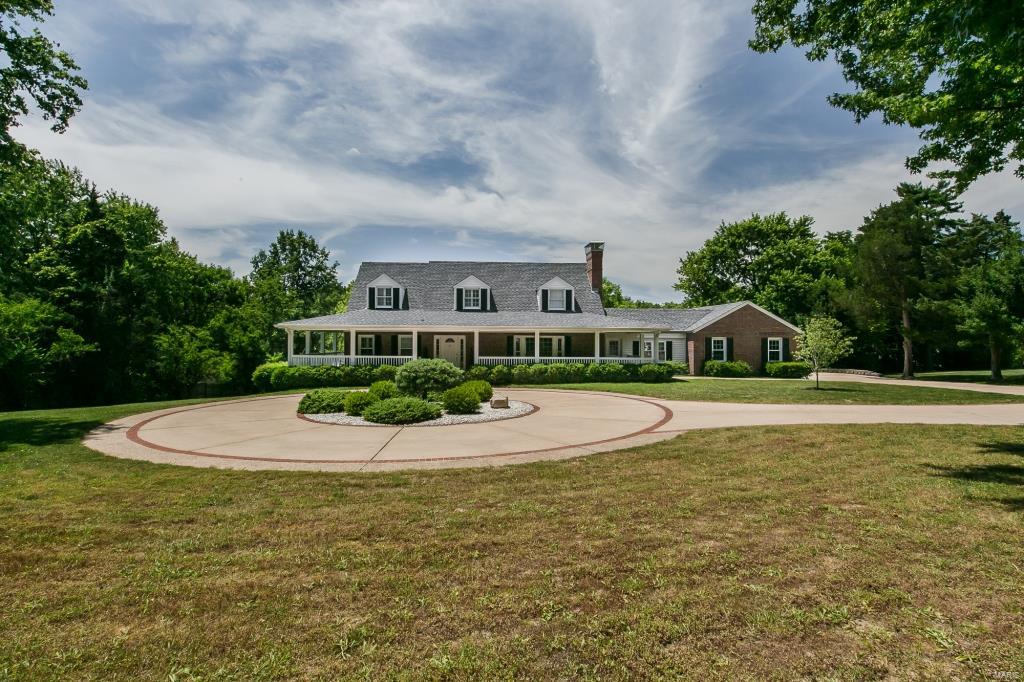Spectacular 2sty on a picturesque lot, in Creve Coeur. Open floor plan w/4Bds/4Bths & 4600+ sqft of living spc. Entry w/crown molding & arched doorway, Living Rm w/woodburning fireplace & custom built-ins & Dining Rm w/tray ceiling. Renovated Kitchen (2016) w/new cabinets, Quartz counters, backsplash & SS appliances. Breakfast Rm w/French doors; Great Rm w/custom gas fireplace & fabulous 3-Seasons Rm. Main Floor also finds 2 Bds & updated Bth. 2nd Flr Master Ste w/built-ins, walk-in closet & luxury Bth; & Guest Ste w/full Bth. W/O LL offers Family Rm, Rec Rm, Bar Area, Office Area, full Bth & plenty of storage! Highlights: hardwood floors (‘16), freshly painted (‘16), new roof (‘14), thermal windows, updated lighting & O/S 3-car attached, garage. Relax outside on the wrap around porch, on the terrific deck, or on one of two patios & admire the park-like yard. The location could not be better - minutes from restaurants, shops & parks. Easy access to hwys. Top Rated Ladue Schools! Additional Rooms: Mud Room, Sun Room