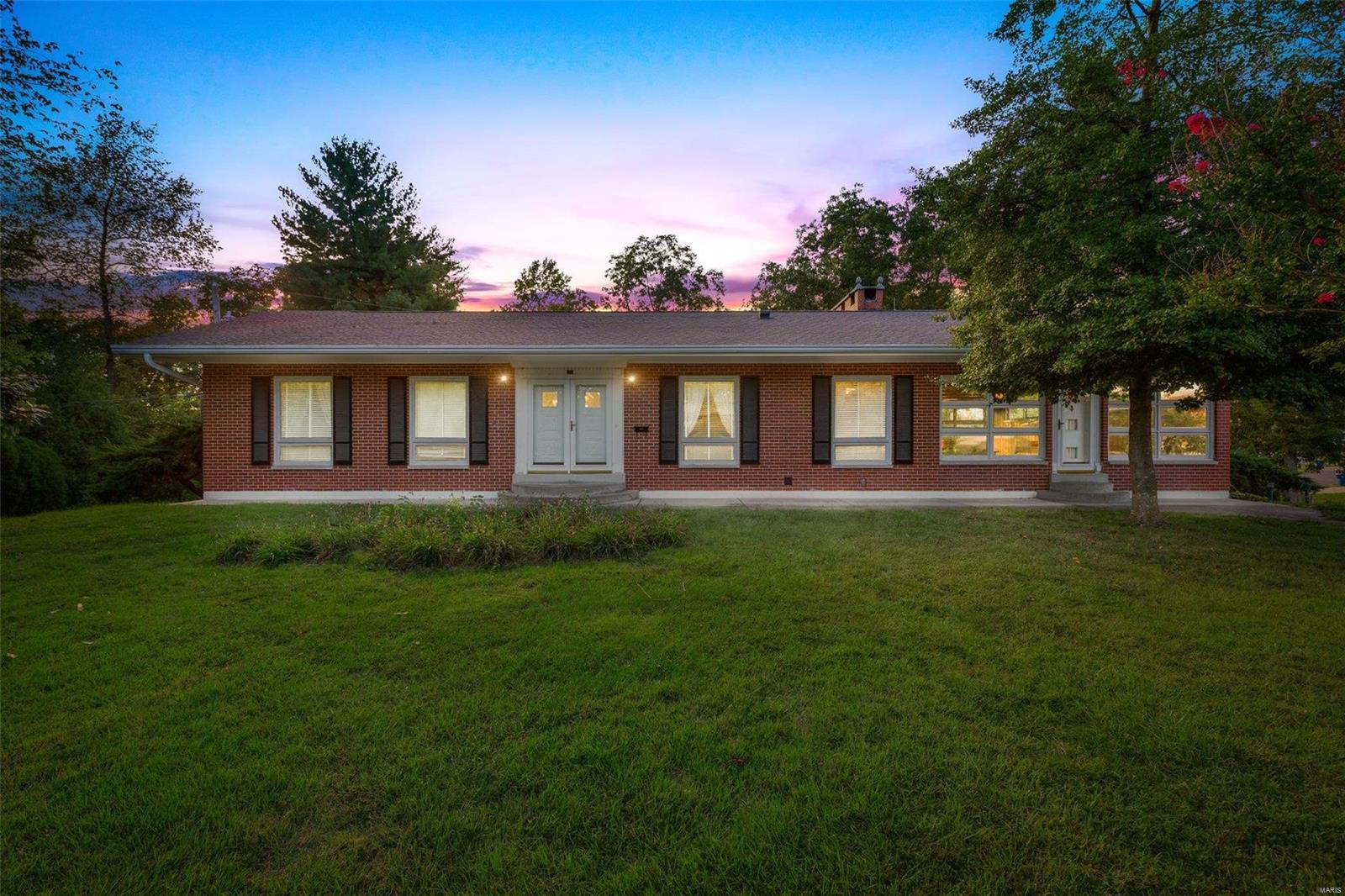 Come check out this one of a kind well built, well kept beautiful ranch nestled on a corner lot, on almost an acre park like setting. This large brick ranch has 4 bedrooms (possibly 5), a large family room in the basement, a main level INDOOR patio with a fireplace/grill, storm shelter, beautiful landscaping and so much more. This home offers exposed redwood beams in the basement and indoor patio (aka entertainment room) which sets this home apart from other ranch homes in the area. First time this house has ever hit the market, and I'm sure whomever gets it will love it as much as the original family has loved it over the years. Additional Rooms: Sun Room