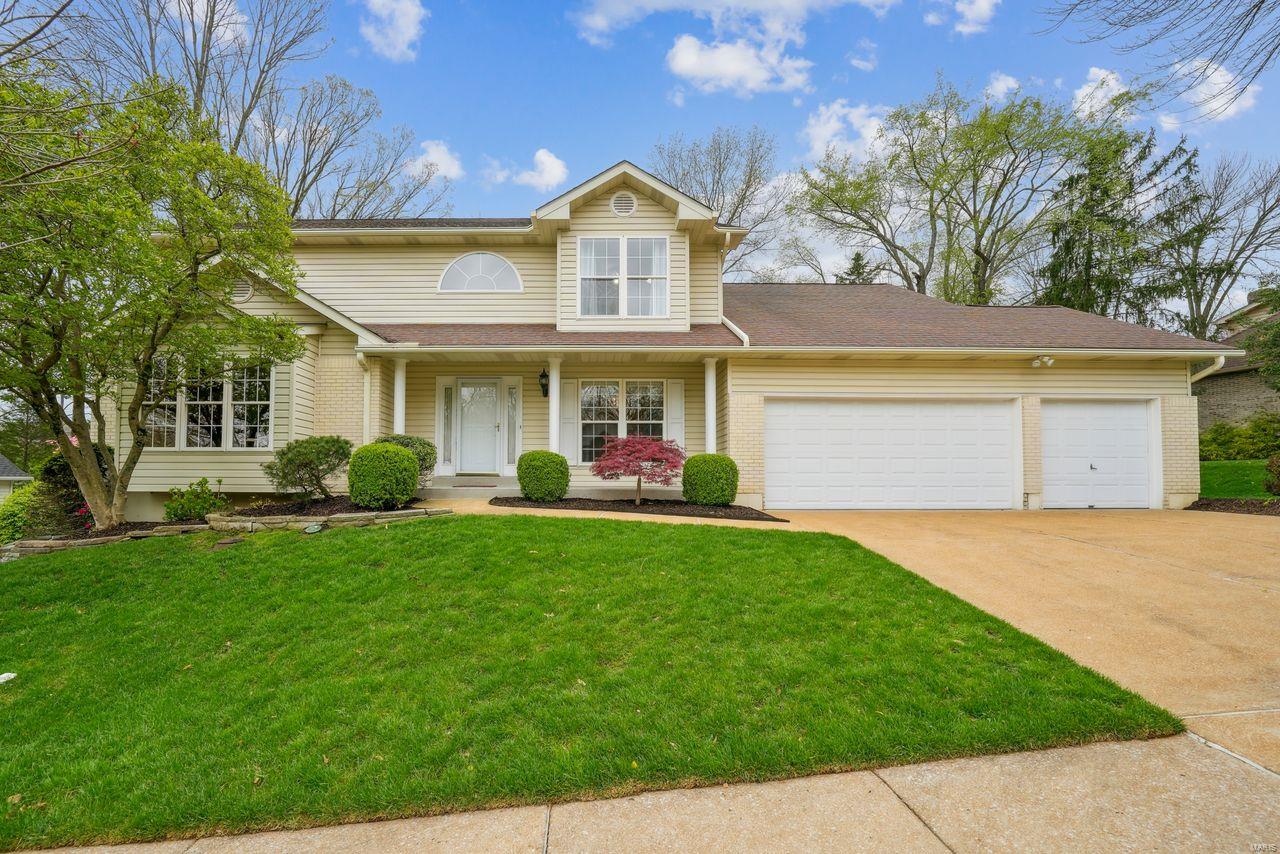 There is so much to love in this beautifully maintained 1.5 story! The great layout, spacious rooms, all the large windows filling the home with natural light & that backyard oasis are just a few of the features! Wood floors grace the dining room & hallway! The great room features vaulted ceilings, arched windows, & a fireplace! Nestled in between the great room & dining room is a bar area perfect for entertaining! The kitchen is open to the great room & boasts white cabinets, granite counters, a planning area & connects to the laundry room that also serves as a spacious pantry! Walk out from the kitchen to the patio beautifully landscaped with retaining walls, a waterfall & pond! If you’re looking for another retreat, the spacious primary bedroom features a great walk in closet with built ins & an en suite! This bathroom boasts separate vanities, shower, & a tub! Upstairs you’ll find 3 nice sized bedrooms! This home is in a desirable area & just one you’ll want to see in person!