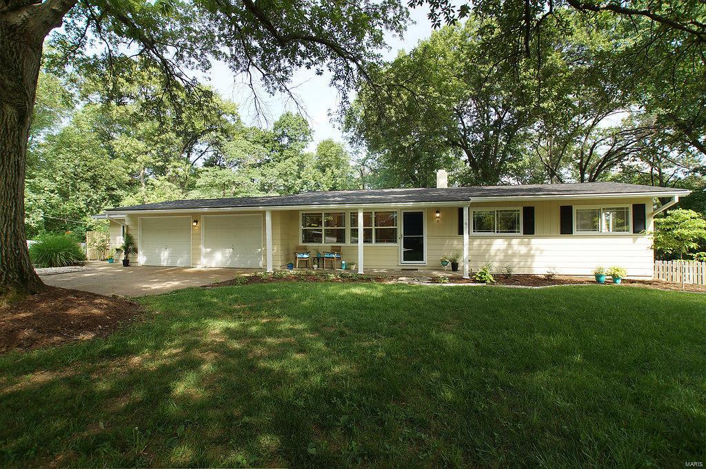 .Updated ranch- end of culdesac with oversz 2 car garage, large private lot, above ground pool, 3 bedrm, 2 full bath. Roof 2014, covered porch to vaulted living rm & hardwood floors (refinished 2014). Dining rm with lg window view of backyard. Updated kitchen: white cabs, SS microwave, dishwasher & gas stove. 3 bedrms on main floor with new carpet & interior paint. Mostly 6 panel doors & newer windows (2014 & 2018). Main bath gutted 2014 with beautiful tile & vanity & lg linen closet. HUGE 31 X 23 , drywalled garage with workshop area & service area to addl patio. Lower level with huge family rm, built in bar, full updated bath & large storage area. Lower level opens to large patio & wood fence (2014) yard, newer tin roof on lower patio (2015)  that backs to trees. 3 year old 27' round above ground pool. HWH (2017), most of exterior & interior painted (2018) Parkway Schools. HSA home prot .Close to Hwy 141 & Manchester!