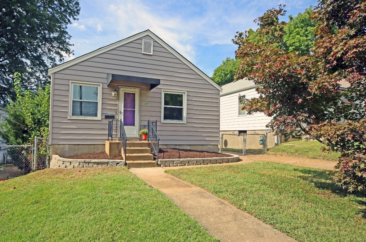 An excellent 2 bedroom, 1 bath bungalow on a quiet cul-de-sac street in Dogtown! Hardwood floors throughout the living room and both bedrooms. The main living space has an open flow between the kitchen, breakfast area, and living room. The kitchen features ceramic tile floors, matching white appliances, and a convenient breakfast bar. The full bath is nicely updated with a ceramic tiled shower and floor, and newer vanity and fixtures. New windows, updated HVAC, and ceiling fans. Fenced backyard with an inviting back patio and a convenient utility shed. Don't miss this move-in ready home in the heart of Dogtown!