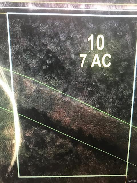 Looking for a few acres not far from town to build that dream home? Come take a look at this 7 acres. Mostly wooded and gently rolling land.
