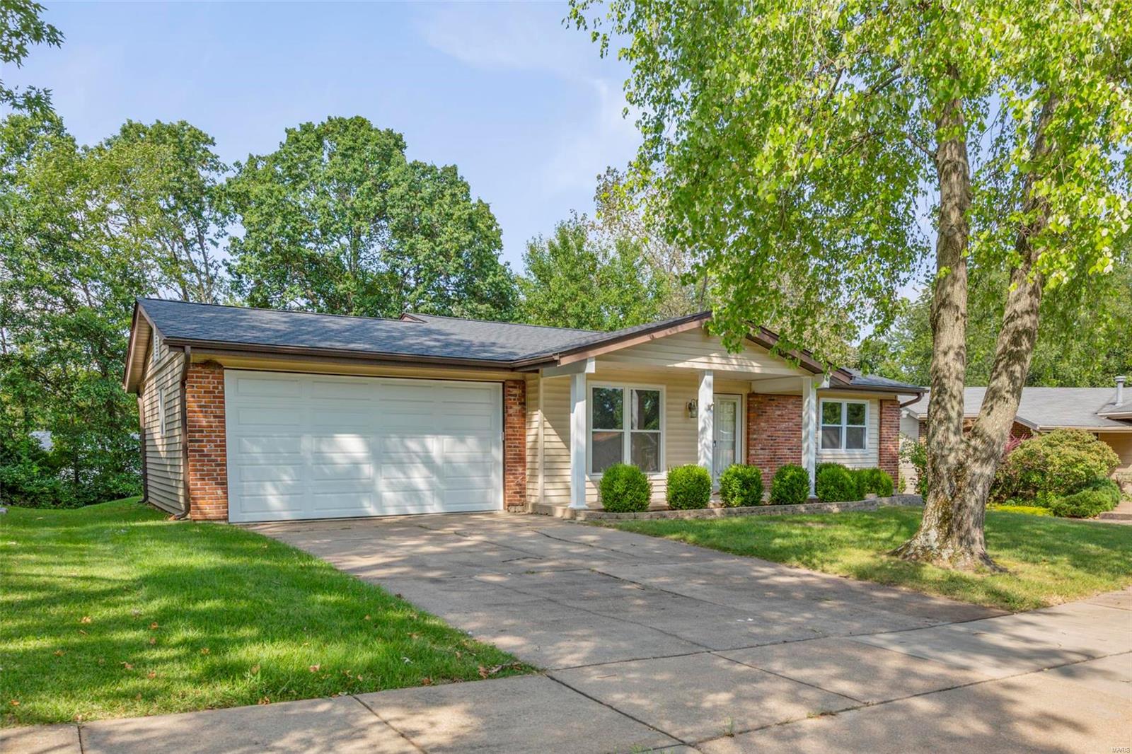 Beautifully renovated 3 bed, 2.5 bath brick ranch in Ballwin. This home resides on a quiet subdivision street and backs to woods providing privacy. Seller has made several updates such as new flooring throughout both levels, granite counters in kitchens & baths, SS appliances, and fresh paint. In addition to the 1300 sq ft above there is an additional 700 sq ft in the finished basement with walk out and wood burning stove and another 1/2 bath. Ample room to spread out or convert to sleeping, rec room, etc. The backyard has multiple patios and deck just off the eat-in kitchen. Top rated schools conveniently located in close proximity to major highways and Manchester Rd. This home is vacant and ready for a quick close!