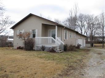 Priced to Sell fast!  Home on large .551 acre lot with 3 o/s car attached garage!  Properties like this don't come along often!  Ready to move into and features vaulted living room/kitchen as you enter plus main floor master bdrm with solid wood 6 panel doors plus two more bdrms in the walkout lower level (one bdrm has no window)plus a 2nd bathroom and walks out to nice size patio-some newer windows and vinyl siding-great location close to schools and shopping-utility shed-home has forced air heat and air, the space heater in basement is just extra supplement