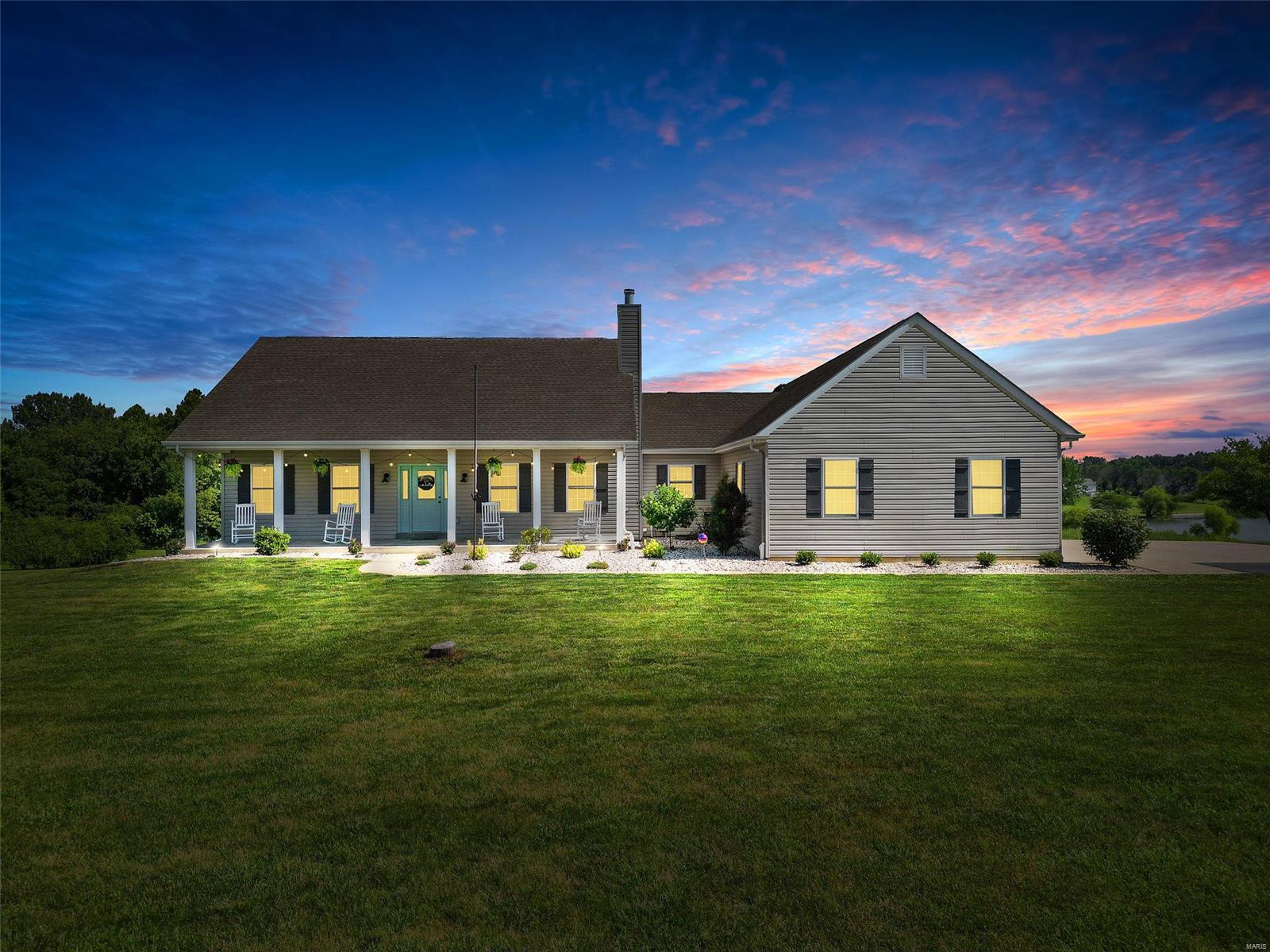 Craftsman style 4 bedroom 4 bathroom Ranch on 3.6 acres with a Stocked Lake has everything one could wish for! Enjoy the country life and breathtaking views off the rear deck in the morning, fish the lake in the afternoon, finish the day grilling your freshly caught dinner on the covered patio below! Upon entry the newer LVP floors grab your attention. Leading into an updated open concept kitchen, ideal for everyday living and entertaining. Soaring 10ft ceilings throughout the main level create inviting spaces in every room. The other many highlights to this home include jack and jill secondary bedrooms, main floor laundry, powder room for guests, an expansive 30ft rear deck, updated large master bedroom with a custom accent wall, updated master bathroom with soaking tub & separate shower, double sinks & a custom walk-in closet. The LL offers 9 ft ceilings with an expansive finish offering bed & bath 4, a rec room, office, dry bar, a large wood shop, and plenty of storage remains!