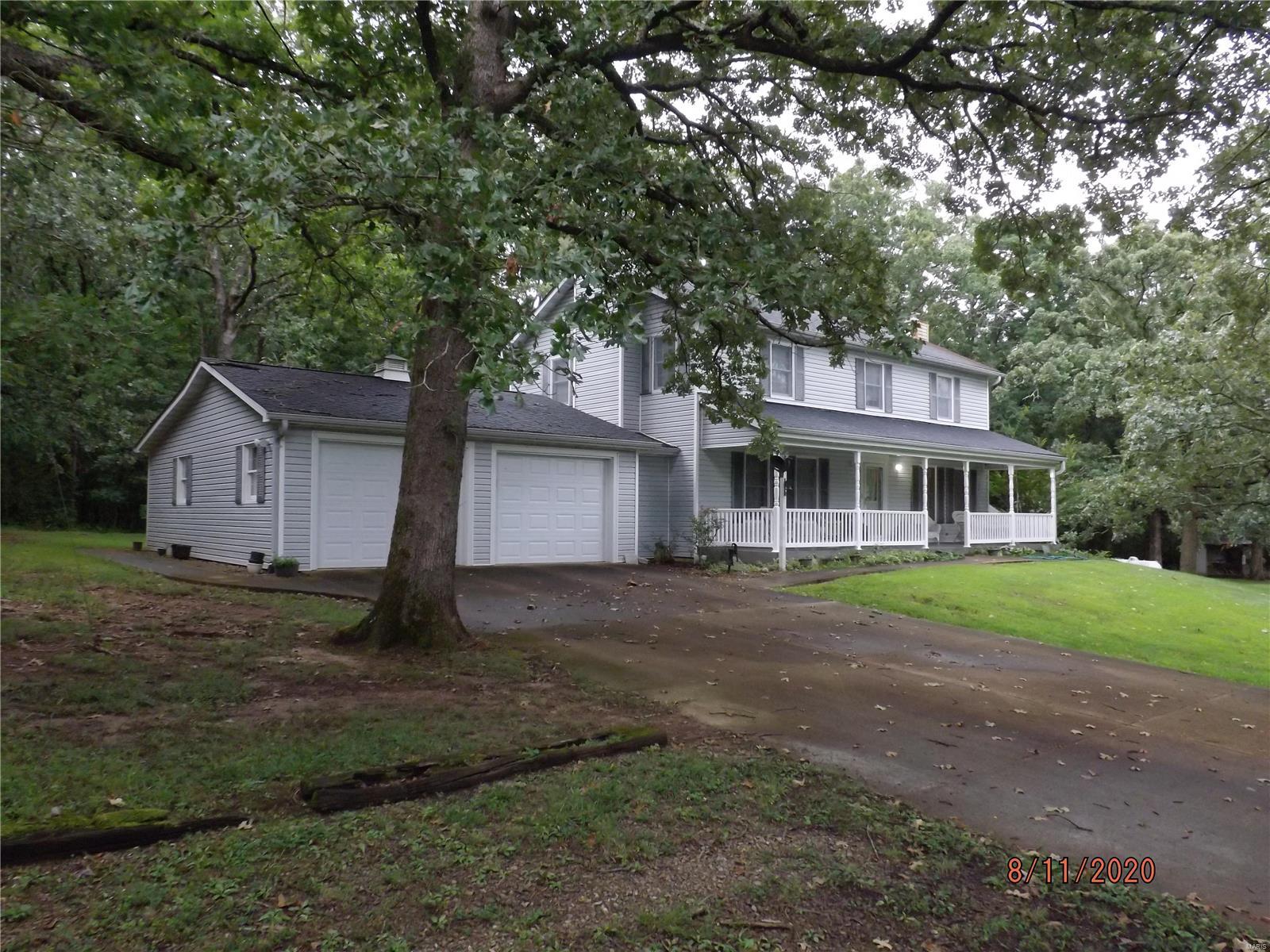 Come take at look at this gem - a  2 story home on approximately 22 acres! This beauty is nestled off the highway away from the hustle and bustle of the world yet is conveniently located 5 minutes from Potosi. The owners have spared no expense during their ownership. This home was built in the early 1980's and has had only 2 owners. The home features an eat in kitchen with a formal dining room, large living/family room & 1/2 bath on the main level, and 4 bedrooms and 2 bathrooms on the second level. Also, on the main level the home is set up with space for a home business. The full walk up basement is partially finished and has loads of storage space. The property has a 2 car attached garage, and 3 car detached garage.



Call us today to set your personal showing!