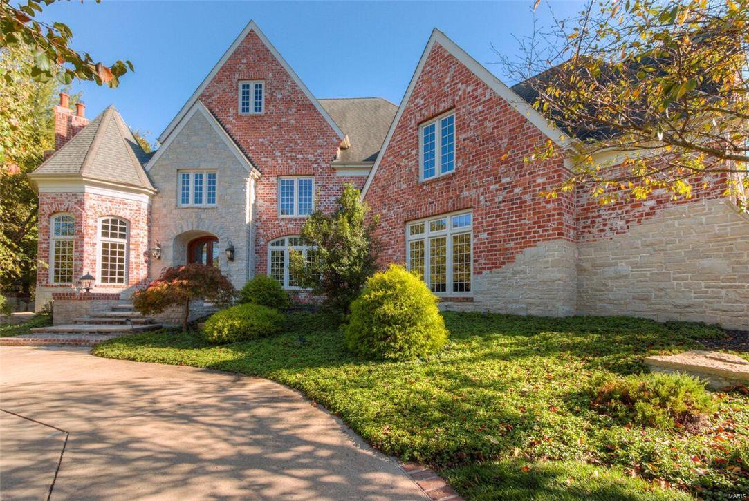No detail was overlooked in this stunning move in ready home. Entern the 2 story foyer with the custom profile casing, crown molding, and 2 curved staircases.  Main level has a master suite with custom closet, French doors,coffered ceiling and access to the study.  Master bath features separate vanities with slab marble counter tops and drop-in bowls, a dual head shower.  Updated gourmet kitchen with 6 gas burners, Wolf cooktop, Subzero stainless refrigerator and microwave.  The home offers 3 gas burning, full-masonry fireplaces and 1 wood burning fireplace located in the lower level.  Upstairs offers 5 bedrooms and 3 full baths.  The downstairs has a large rec room, pool table room, workout room,7th bedroom with full bath, wine cellar and wet bar.  Relax outside in the private wooded oasis next to the pool and cascading waterfall.  This home is a true gem.