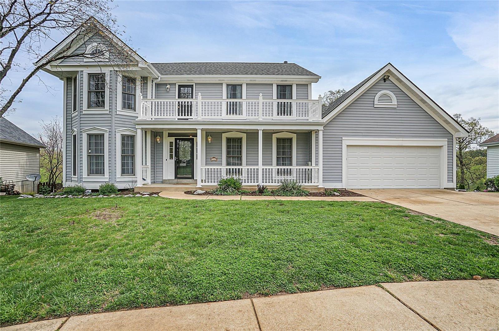 Beautifully Updated 2-story offering 4Beds, 3.5Bath, Walk-out, Oversized 2-Car, with a ton of indoor & private outdoor space to entertain in AAA Rockwood Schools! Newer Carpet, hardwood, crown, Ventless Gas & WB fireplaces, ML Laundry, ML & UL areas freshly painted, 6-panel doors, in-ground sprinkler. Open Kitchen/Break/Family Rm with an abundance of natural light, built-ins, planning desk, cnt isld, & more! Sophisticated Master with French door entry, seating area, walk-out balcony, bay, vaulted & coffered ceiling for a grand feel, & dbl walk-in closets leading to a spa-like ensuite w/porcelain tile, newer faucets, shower hardware, & toilet, dbl vanity & jetted tub! 3 additional beds all good sized. The one with the pocket door entry has built-in shelves currently in closet spot. Two decks have newer planking & railings and are ready for your BBQ. Patios offer additional seating areas in the back or enjoy the quiet neighborhood from the front porch.