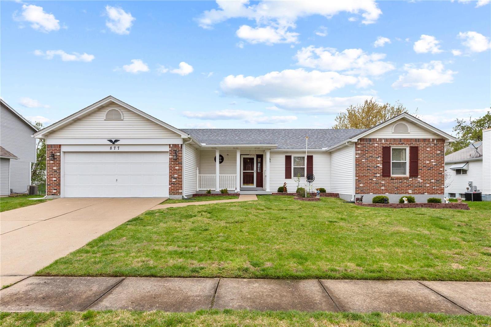 Located in the sought after community of O’Fallon Missouri, this gorgeous property has been well maintained and is move in ready! The exterior of this lovely home boasts low-maintenance brick/vinyl siding, spacious 2 car garage, landscaping, nice sized fenced-in backyard with shed. The interior is sure to WOW and welcomes you with a large family room that offers vaulted ceilings and gleaming hardwood flooring. The main level also includes a laundry room and office/formal living room. Any home cook would be pleased with this beautiful kitchen that includes ample counter space, pull-up peninsula, some stainless steel appliance and a large dining room that boasts a bay window and sliding glass door walk-out to the screened in 3 seasons room. Down the hall you will find 2 guest bedrooms, modern full bath and primary bedroom featuring en suite w/dual vanity, tile flooring and large walk-in shower. An unfinished basement offers the buyer plenty of space for home expansion or storage.