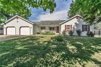 You will love this updated 4 bedroom 4 bath ranch home on large double lot!Walking up to the home you will notice the professional landscaping & large covered porch!As you enter the home you are greeted w/ a large living room w/ gleaming newer wood flrs & wood burning FP!Your bkfast room off your living room has access to your large deck!Your see through kitchen w/ new floors has a breakfast bar, upgraded cabinetry & appliances. Your M suite is completely remodeled w/ new shower & flooring! Its spacious with vaulted ceilings and WI closet!Your 3 other bedrooms are overly spacious & your guest bathroom has been updated as well! Your LL has a rec room & sleeping room that can be used as a 5th bedroom!You also have a half bath in the LL.Your LL walks/o to your large fenced lot & back asphalt drive that has been added for extra parking.It easily fit a large boat & trailer or 3 cars.Dont forget your MF mud room.Laundry room!Your garage is fully insulted & wired w/ 240 service!Stop by today!