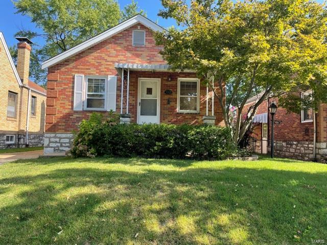 Time to bring this South St. Louis Gem back to life! Sure... the house may need work, but it is definitely within the budget! With time, care, and vision this home will once again become the Charming Brick Bungalow it was meant to be. Fantastic location!  Enjoy walking to nearby Moms Deli, Ted Drews, Legrand's, numerous Parks, shops & more! Enter to find hardwood floors and pretty stained glass windows in the Living room. Charming built-in cabinet found in the Dining area. Small but adequate Kitchen. The two main floor Bedrooms are generous in size and serviced by the Hall Bath.  The original wood doors are beautiful!  Great potential in the Lower Level, too!  Outside enjoy a nice patio and a pretty fenced yard with lovely shade trees and a few garden beds.  You'll love the off-street parking with private driveway leading to the detached garage!  Looking for that special Buyer!  Please note that no repairs will be made by the seller. Buyer responsible for STL City occupancy inspection.