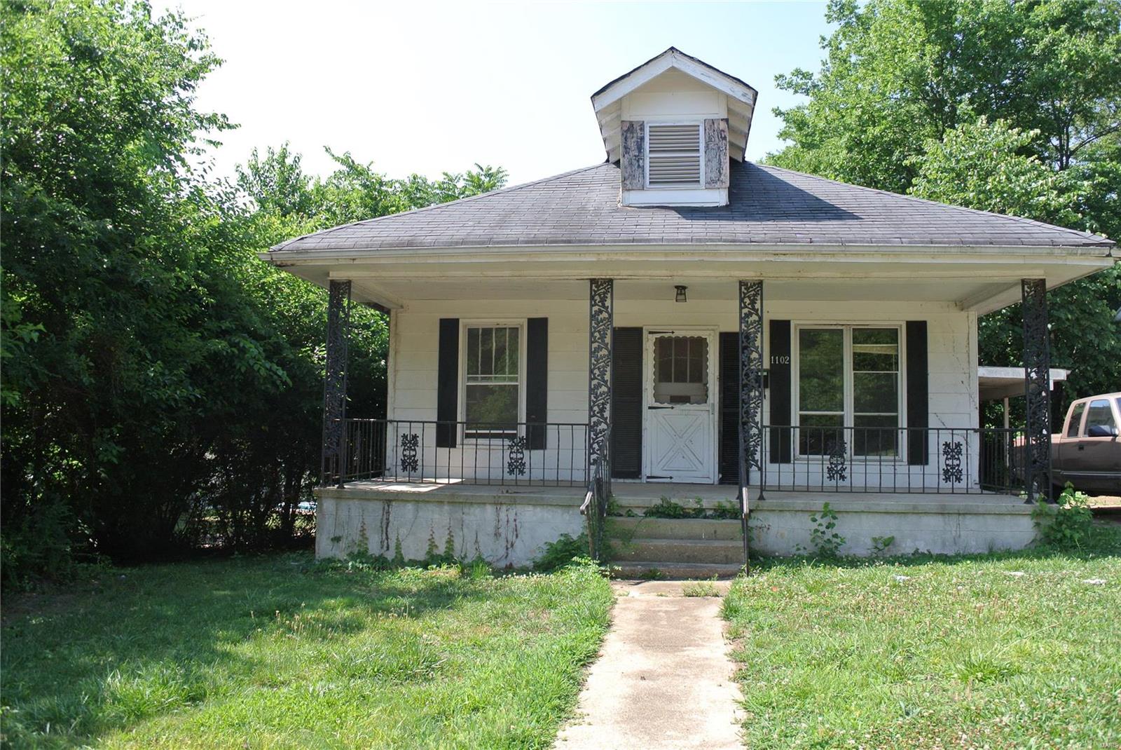 Large 2, could be 3 bed, 2 bath house sitting on a nice shaded corner lot. Home would be a great investment property or flip. House has covered parking and small storage shed.