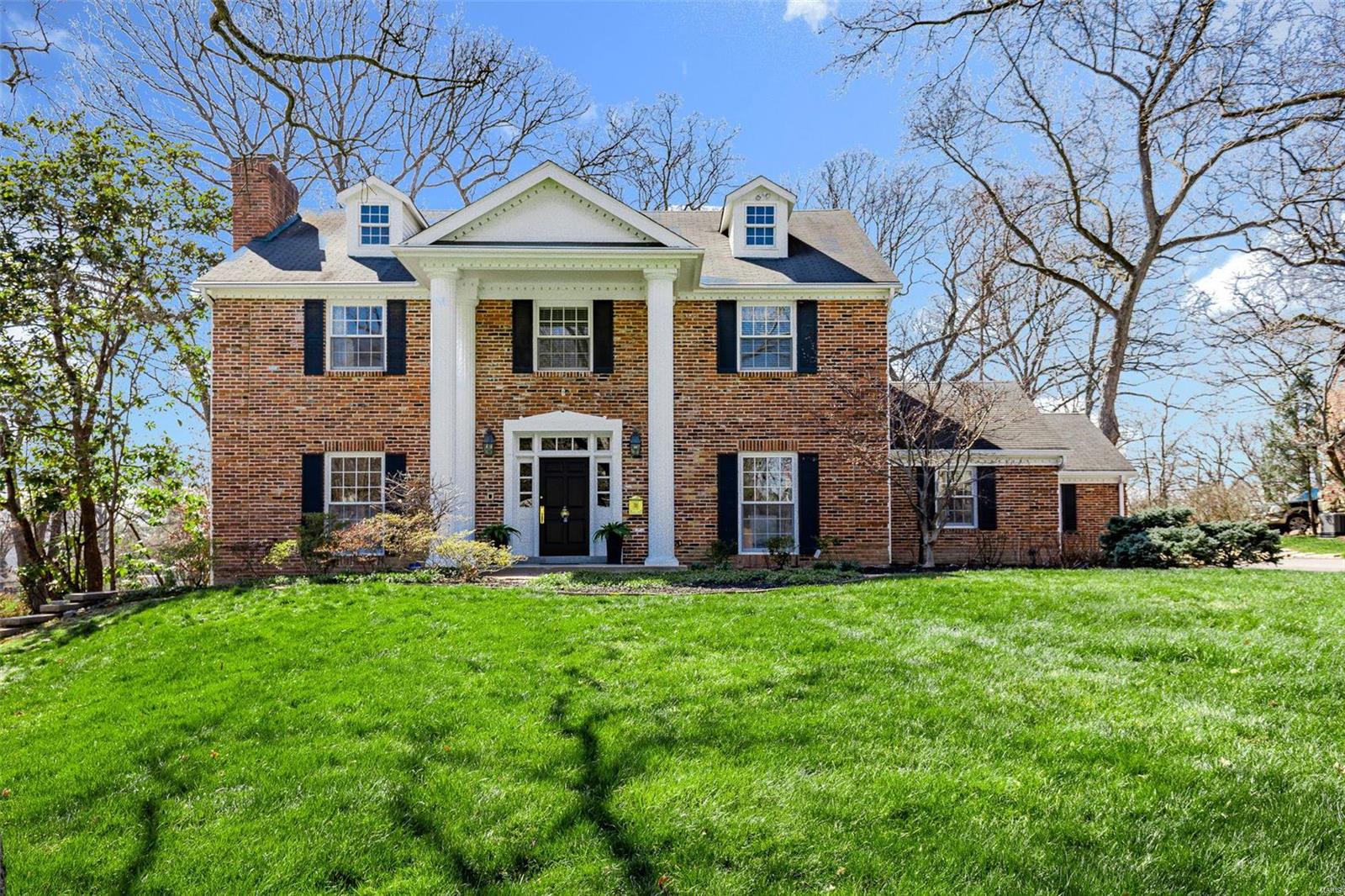 Showings begin on Friday March 24. Stately brick two story on large 1+ acre lot in highly sought picturesque Fair Oaks. This beautiful home boasts 5 beds 3 1/2 bath and 3 car garage. Main floor offers mostly hardwood floors throughout, large formal dining room, gorgeous hearth room with oversized wood-burning fireplace and wood ceiling beams, living room with additional fireplace, updated kitchen with center island, double oven, and wet-bar, laundry room, and office/MIL suite. Primary bedroom suite offers large walk in closet, bath with double sink, separate shower and tub. Enjoy summer evenings on lovely screened in porch open to oversized brick patio all overlooking gorgeous park like setting with a view of #3 Bogey Club. Desirable location close to highways, shopping, schools, and restaurants.