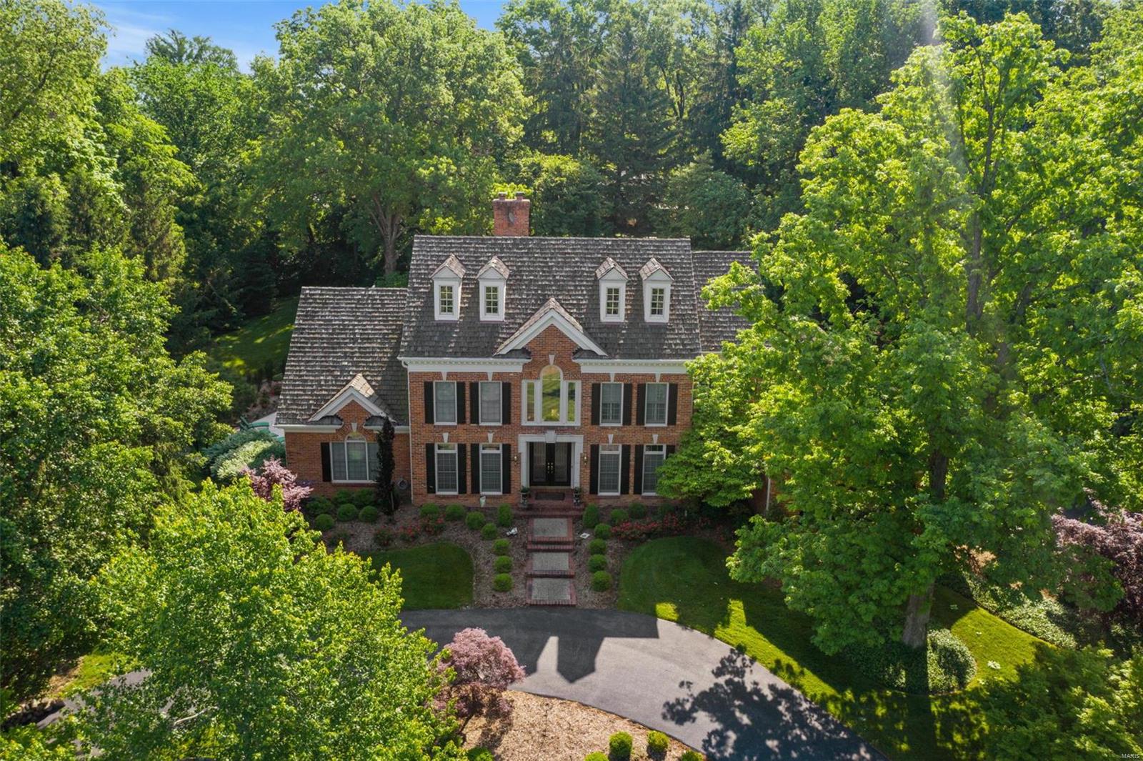 Spectacular Custom Grotpeter 1.5 Sty * 1.5 acres in heart of Ladue! * 5 BDRs/4 Bths/2 Half bths * 6,000+ SqFt Fin Total Living Area  * Quiet Cul-de-sac * Beautiful Inground Pool & Spa * 3Car Htd Gar * Stunning 2 Sty Entry & light-filled GrtRm FP & wet bar * Spacious 1st Flr Mstr Ste w/2 Wlk-in closets * Gorgeous expansive open Kit w/2022 42” uppers & refaced lower cabinets * Lrg Cntr Isl w/downdraft & Bkfst Bar seating * 2022 Bosch Dshwshr & Sub-Zero * Darling Brkfst Rm & Delightful Hearth Rm w/FP * Mn Flr Landry * 3 Huge BDRs upstairs w/wlk-in closets & 2 bths * Fantastic fin Wlk-out LL w/9’ Pour * Fam Rm w/FP & full wet bar area w/granite, dshwshr, sink & area for Frig * In-Law 5th BDR Ste or work-out room w/full bth *  Amazing Theater/Game room w/AV system for house & pool * Handsome Billiard Rm * Cedar closet * Take the party outside to the fabulous Pooltron pool  * 2022 Roof/Gutters & Mn Flr HVAC * Cent Vac/Sec & Sprnkler Sys/Wtr Sftnr * Sought-after Ladue Schools! * Welcome Home! Additional Rooms: Mud Room