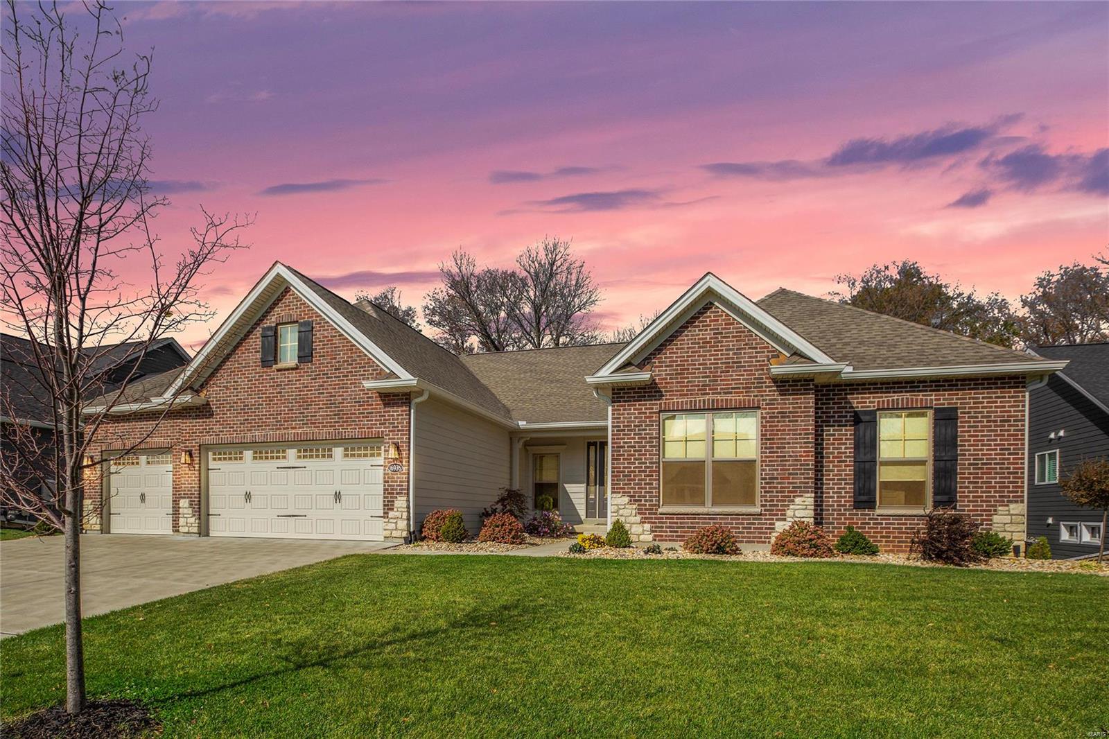 Stunning ranch on a .33 acre, walk-out lot, in the sought-after Fienup Farms! This 2 year old, Fischer and Frichtel built home, boasts 3 Beds / 2.5 Baths, and 3400+ sqft of living space! Highlights include: 3-car oversized garage with space for a small 4th car or lawn equipment, open floor plan, recessed lights, LVP floors throughout most of main, office/den, Great Room with abundance of natural light, gas FP & custom mantle. Kitchen features granite, 42” cabinets/crown molding, SS appliances, walk-in pantry & oversized center island with Quartz counter, opens to the adjacent dining area, spacious Primary Suite w/ tray ceiling, luxury Bath w/ tile floors, walk-in shower, dual vanities & walk-in closet. Main Floor Laundry Room! Partially finished, walk-out Lower Level with Rec Room. Relax on the patio or composite deck with screened in area & enjoy the privacy! Subdivision amenities: playgrounds, picnic areas, pavilions, lake access & multiple pickleball courts!