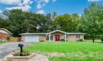 Have you been looking awhile for a move-in ready home in the Fox School District under 200,000?  Well, look no further.  This is a MUST SEE!!  This darling 3 bedroom, 2 bath 1600+ square foot ranch is on a 1-acre professionally-landscaped lot in the charming Scenic View Acres subdivision just a short drive from Arnold.  Enjoy the fall weather on the patio surrounded by a park-like setting or in front of the fireplace in the over-sized family room.  The eat-in kitchen has updated stainless steel appliances, 42" custom cabinetry and plenty of counter space and HARDWOOD!  This home has been immaculately cared for with NEW FLORRING in all the bedrooms, NEW ROOF in 2016, NEW SIDING, NEW FURNACE and A/C in 2017.   The partially-finished basement has tons of storage with a rec room area, laundry room and a bar area perfect for entertaining.  Be sure to see the Video Tour!