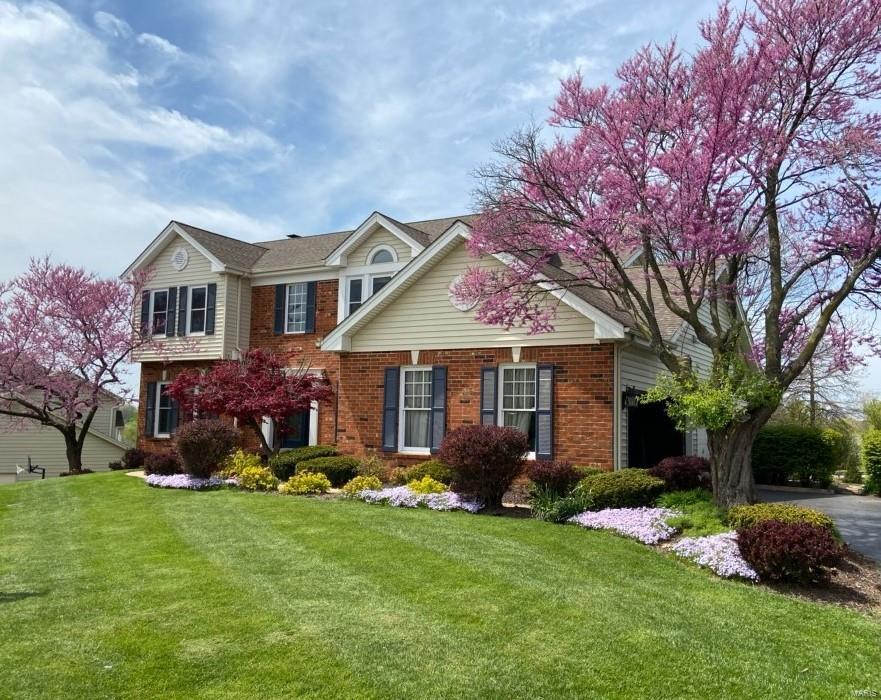 HUGE PRICE REDUCTION, EASY TO SHOW. Centrally located, this Parkway West beauty features open space w/great flow for living & entertaining. Brand new deck and huge back yard! Newer floors, kitchen upgrades inc newer appliances, 3 car garage and wonderful upgrades throughout. The finished lower level has a large rec room with new carpeting plus a bedroom with Jack & Jill bath connecting to a separate sleeping space or office, and loads of storage space. On the main level, enjoy a dining room w/wainscoting, great room with built-in bookcases, a gracious wood staircase, main level mud/laundry room, breakfast area opening to the deck and backyard. The second level features a large master suite with beautiful walk-in closet, large en suite bath with jetted tub & separate shower, plus 3 additional bedrooms and full bath. Most windows on the main level are new within the last 2 years; St. Louis Closet Co custom closets throughout; Venetian shutters; in ground sprinkler system and much more.