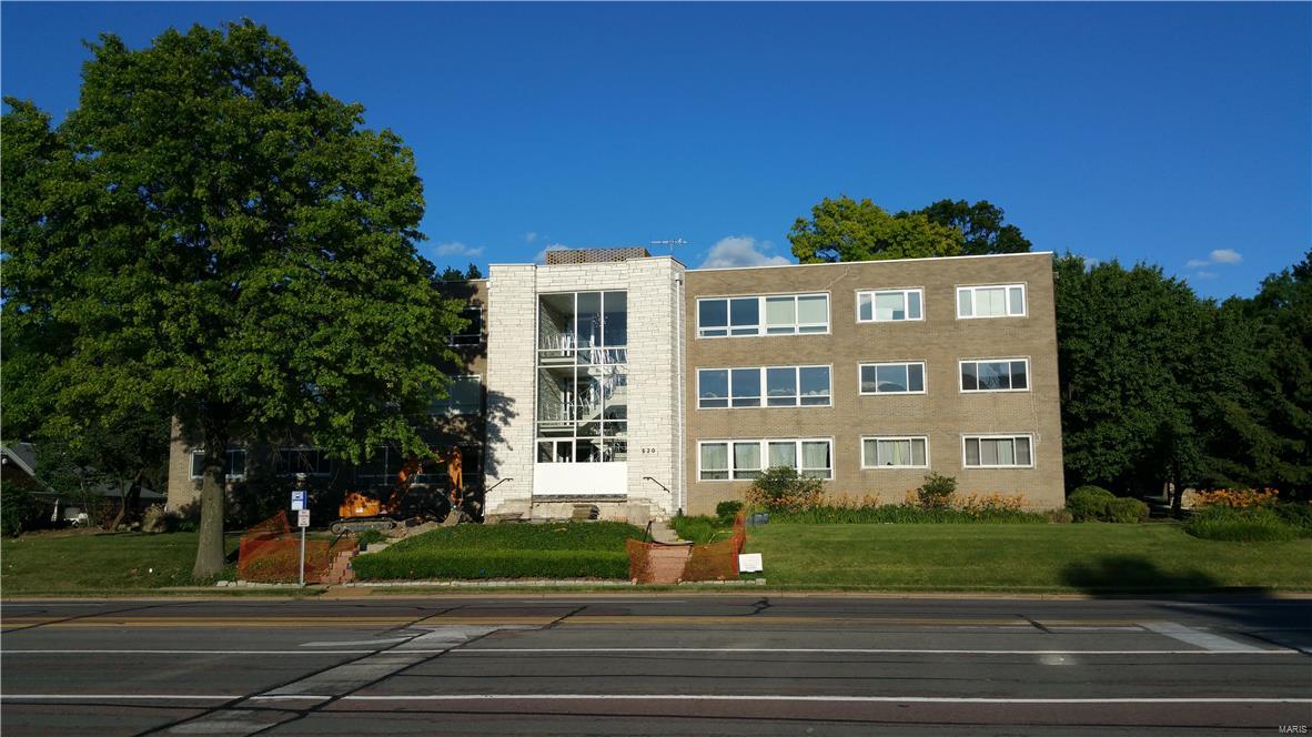 . Bright and spacious Two bedroom two full bath condo in stylish Mid Century Modern Imperial Building. 1590 square feet, two assigned parking spaces, loads of storage and under $200K makes Clayton living affordable. Take the elevator from the bright & secure garage to a beautiful lobby. Enter Unit 1A and you will find a large open living and dining room with a wall of thermal windows which let it the natural light. New Carpet  through out and crown molding in most rooms. Large kitchen with lots of counter space, cabinets and a double pantry. Pass through from eat in kitchen to dining room. Down the hall find a large full guest bath and guest bedroom with a wall of built in shelving. Would also make a nice den or home office.Corner Master Bedroom with double closets and en suite Master Bath. Laundry facility and additional storage in lower level. The rear lobby entry leads to a patio and there is another patio and grilling area on the North side of building. Location: City, Corner Location, End Unit, Ground Level