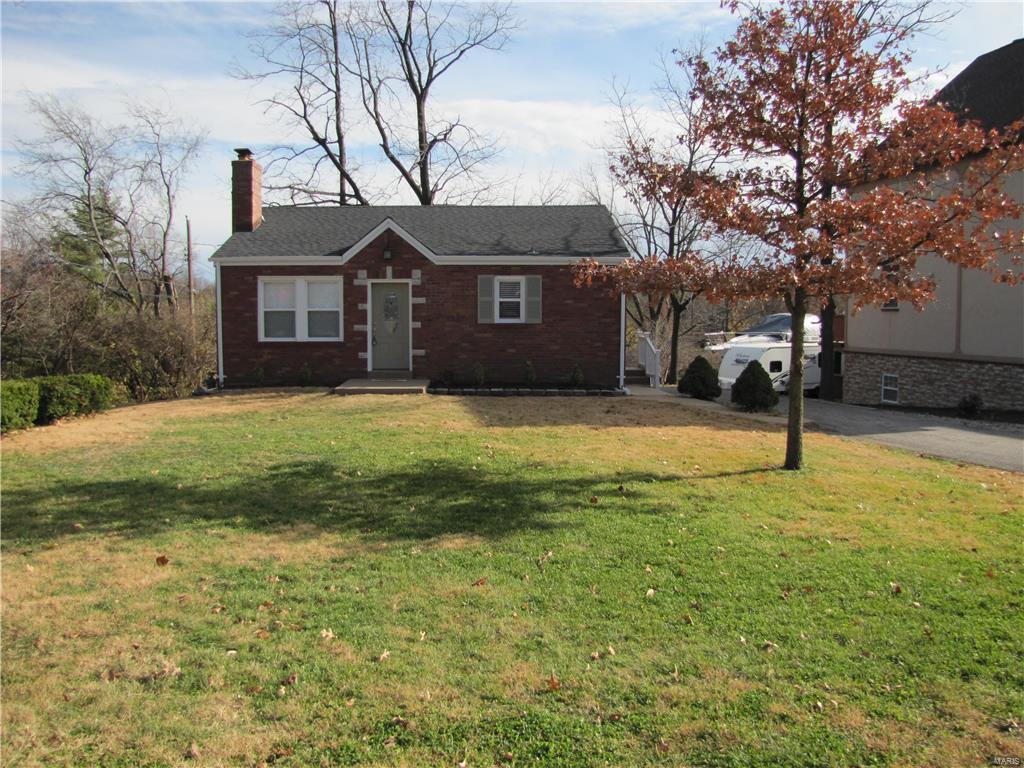 Private setting for this totally updated home located on a dead end street. Large level lot surrounded by tons of green-space not your typical subdivision home. Home has been rehabbed with so many updates. Kitchen has new cabinets and granite counter tops. New ceramic floor  and new appliances except refrigerator. Living room has fireplace and all wood floors have been refinished. panel white doors and new five inch base makes the hardwood floors really stand out. Roof has new layer of shingles. List of other updates: vinyl windows, new light fixtures, freshly painted, new gutters and fascia. Seller is providing HSA HPP for buyer.