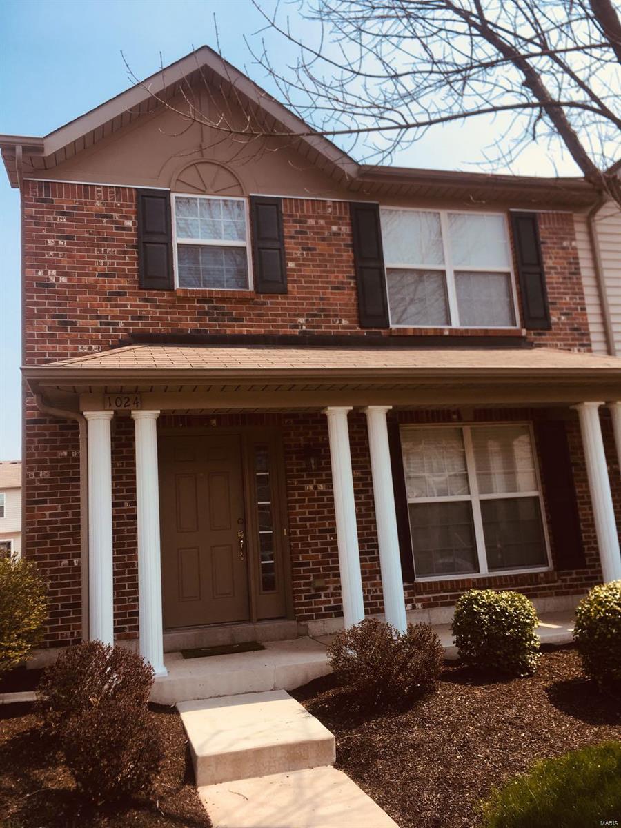 Great location!! This 2 bed/2.5 bath town house in Lake St. Louis is near everything, with easy access to shopping and HWYs 364/40. Neutral grayish paint throughout, with gorgeous hardwood floors on main level and neutral carpet in bedrooms. Master has a huge walk-in closet with a full bath. Very large loft area on second level can be used as game room, office, or second living room. One car garage. Zachary's playground and the community lake with pavillion are right around the corner . Looking for credit score of 630 or higher, good rental history and verifiable income 3x rent. One year lease, tenant pays for utilities but lawn care included. Small dog negotiable with good credit and $500 non-refundable deposit. Application fee is $40 per adult.  NO SMOKING. .