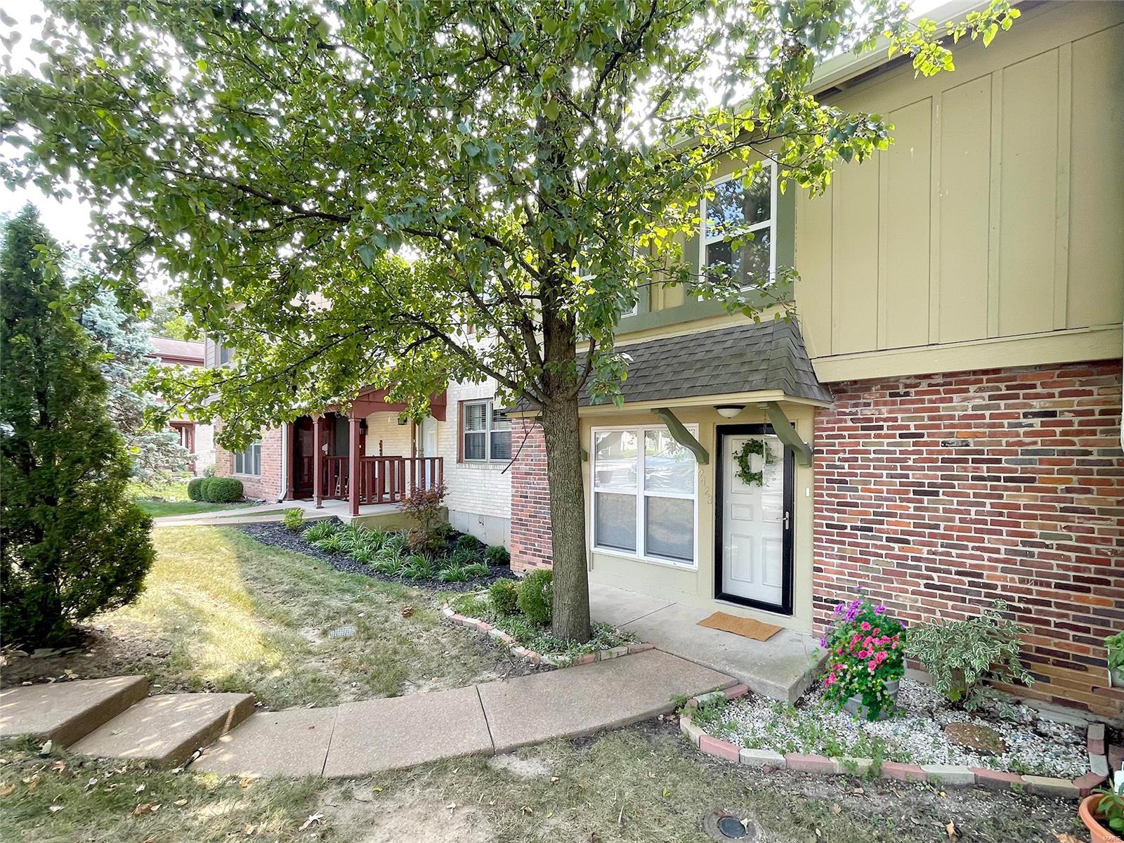 Welcome to this charming townhome in sought after Hidden Meadows condo community. Parkway Schools. A large living room welcomes you in, boasting Luxury laminate flooring through main floor & upper level. Main floor offers: dining room, half bath w/ ceramic tile, & chef's kitchen w/pantry, custom tile backsplash & walk out to large deck that overlooks tennis courts. Upstairs master suite boasts 2 closets, ceiling fan, & full bathroom w/ separate dressing area. The finished lower level is complete w/oversized family room w/walkout to patio. Amenities include: in-ground pool, tennis courts, basketball, & clubhouse just a short walk away. HOA fees cover: water, sewer, trash, & some exterior maintenance. This mid-unit offers 2 assigned parking spaces.  Upgrades: new electrical panel-2019, new furnace- 2022, new ceiling fans throughout, all new windows & doors, new built-in microwave & sink/faucet in kitchen, & Fresh Paint throughout. All appliances stay! Unit could rent @ $2200 month+-. Location: Interior Unit