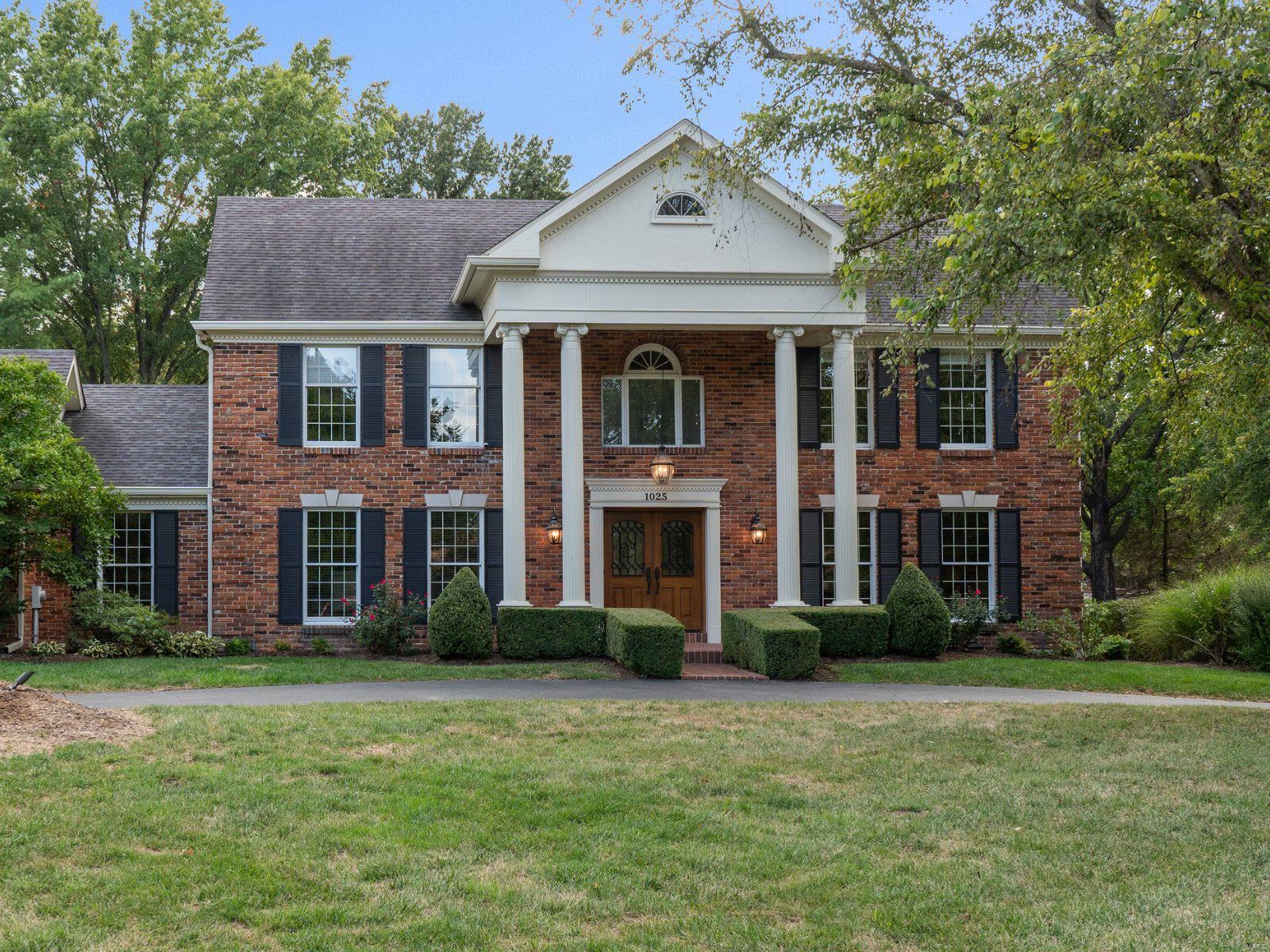 Welcome to this magnificent Town and Country estate. This stately residence presents meticulously updated main-floor living areas, spacious bedrooms, and 3.5 elegantly modernized bathrooms. Step inside to be greeted by soaring ceilings, custom built-ins, and crown molding, all contributing to an ambiance of timeless sophistication. The northeastern exposure fills the home with natural light, illuminating gleaming hardwood floors and tasteful updates.
The main level exudes elegance, featuring a custom office and an inviting living area. The expansive, renovated kitchen, with views of the lush backyard and in-ground pool, serves as the heart of the home. The primary suite offers a luxurious ensuite bath and three oversized custom walk-in closets. Outdoors, the property transforms into a private sanctuary with an in-ground pool and a fenced backyard, ideal for relaxation and entertaining. A perfect fusion of classic charm and modern amenities in an unparalleled location. Additional Rooms: Sun Room