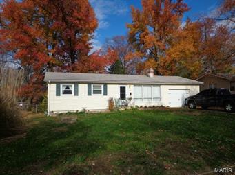 CUTE 3 bedroom Ranch in nice popular area - Newer bathroom, flooring, some windows & fireplace NEVER USED - Big fenced-in yard - 2 storage sheds, big screened in back porch with  patio. Attached garage used for storage & partly converted into small den/office. Could be returned to full garage by removing wall. Farmington school system - Easy to show - Home to be sold AS IS!! Approved for Short Sale.