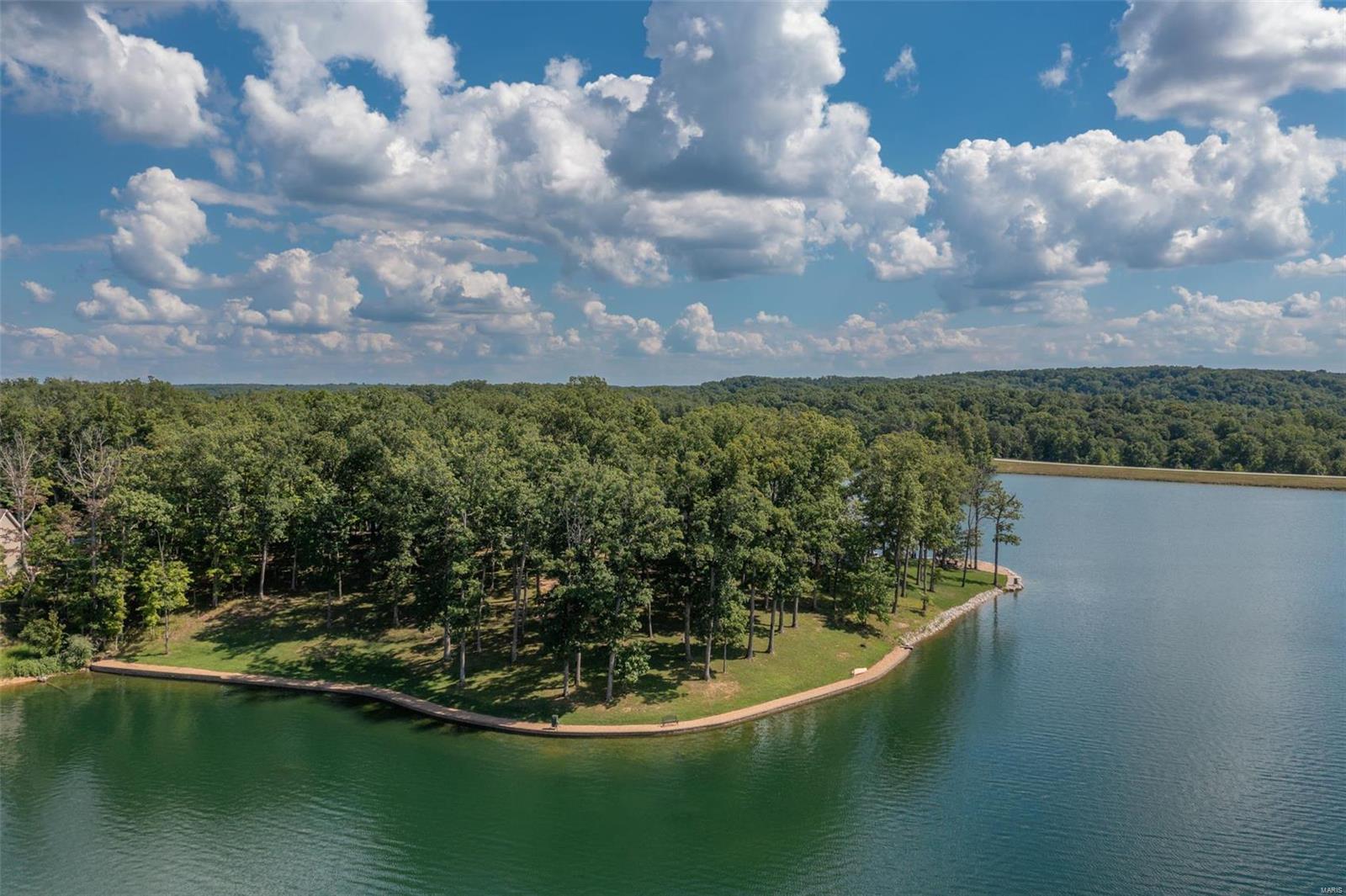 Remarkable View! Gentle Slope! Mature Oaks! Sound enticing.... it should!! One of the most desirable lots on Lake Alpine. 1 Acre with 345' of shoreline finished in versa-loc block. With its Northwest exposure enjoy sunrise and sunsets. Located at the end of the road situated on a cul-de-sac setting offers great privacy and seclusion. This is a must see!! Additional Rooms: In Platted Subdv.
