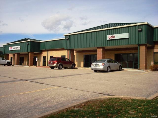 Commercial Office/Warehouse building.  4,100 SF of space.  There is 1,700 SF of office space and 2,400 SF of warehouse space.  The current  build-out consists of a reception area, 3 offices, large conference room, 2 restrooms with slop sink, kitchen/lunchroom, copy area and large bullpen.  Available for lease June 1, 2018. Location: Business Park, Industrial Park, Industrial Area