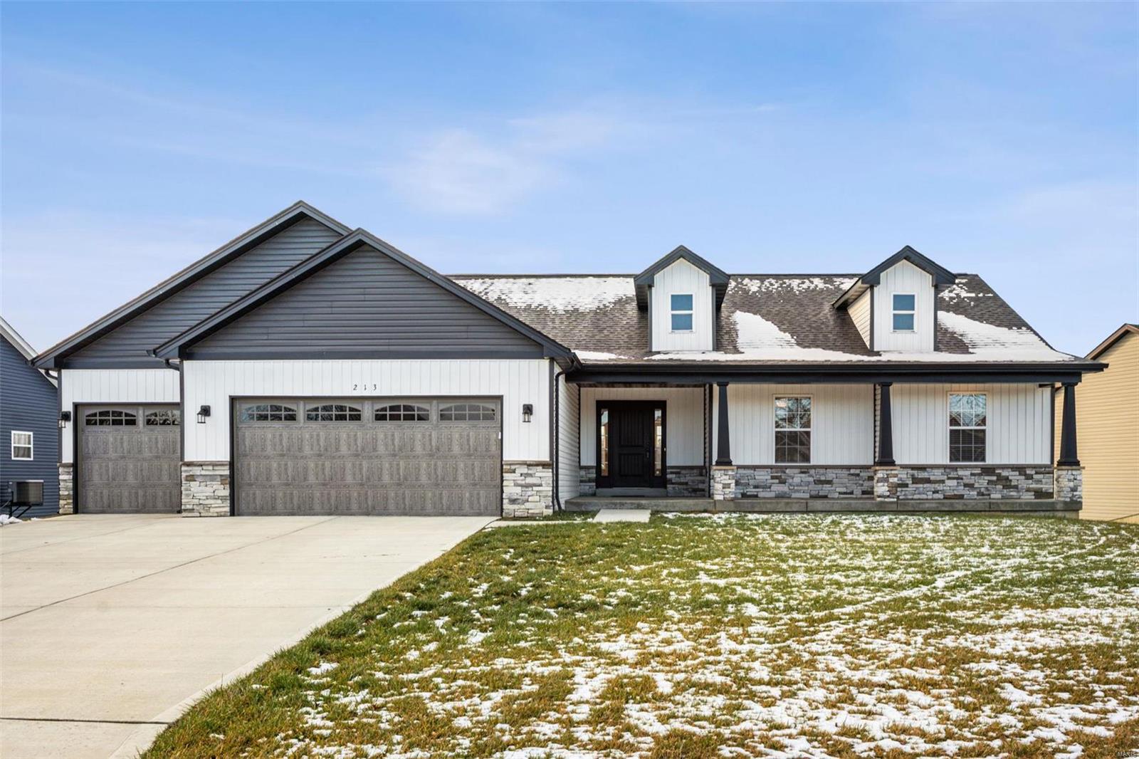 Welcome home! This beautiful craftsman style ranch is 1-year-old and ready for YOU. So many amazing features, you’ll be proud to call this home. Outside features white vinyl siding w/stone accents, charming gables, a large covered porch and a 3-car garage with carriage style doors. Inside is nice & neutral with LVP flooring through the kitchen & great room * Carpet in the 3 large bedrooms * Vaulted ceilings in the great room & kitchen * Kitchen has recessed lights, 42” white shaker style cabinets, granite countertops, a large island – perfect for prep or entertaining and tons of storage. Owner suite has a walk-in closet and the bath offers a large soaking tub, separate shower, adult-height double-sinks & a linen closet. The walk-out basement awaits your finish. It’s ready with rough plumbing, French doors to a big patio & 2 addl windows. Don’t miss: convenient MFL with a large closet * Water softener & water filtration system * Utility door in the garage and so much more! Come see it.