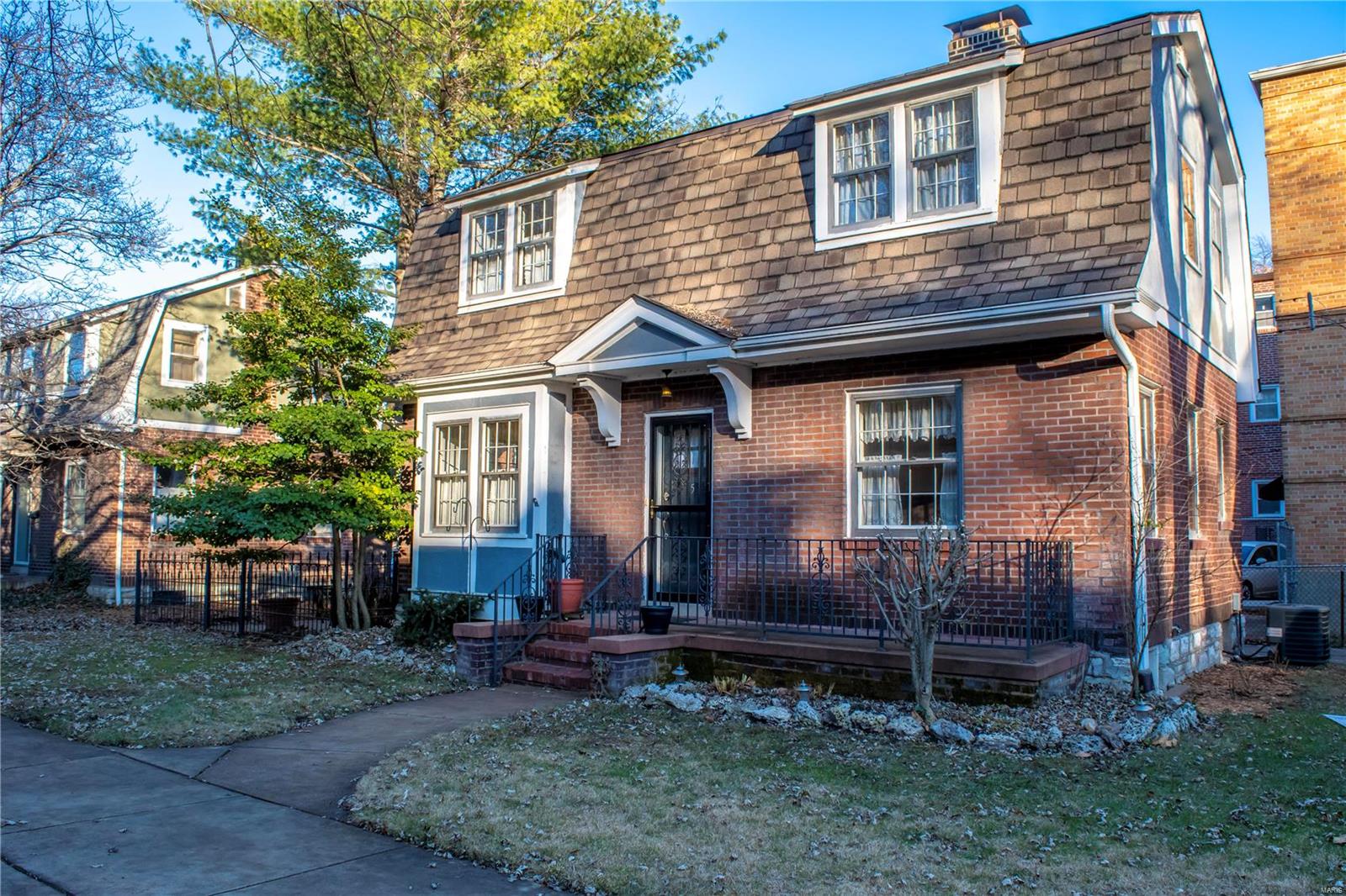 Rare opportunity located in a historical courtyard near Tower Grove Park! This updated 2 story brick and stucco home interior has been freshly painted. This home is located on a private court with only 10 other homes. Hardwood floors can be found throughout. The kitchen has granite counter tops and stainless steel appliances that will stay with the home along with the all in one washer/dryer combo on the second level. Living rm/dining combo and an extra bonus room with built in cabinets on the first level. The upper level has a walk in closet in the M. Bdrm and access to an outside balcony. The second bdrm has an extra room that could be used as a nursery or office area. The private patio in enclosed with a wrought iron fence. There is a walkout basement that has great potential for adding some more living area. Roof. furnace, electric and water heater have all been updated in the last 8 years. Motivated seller!