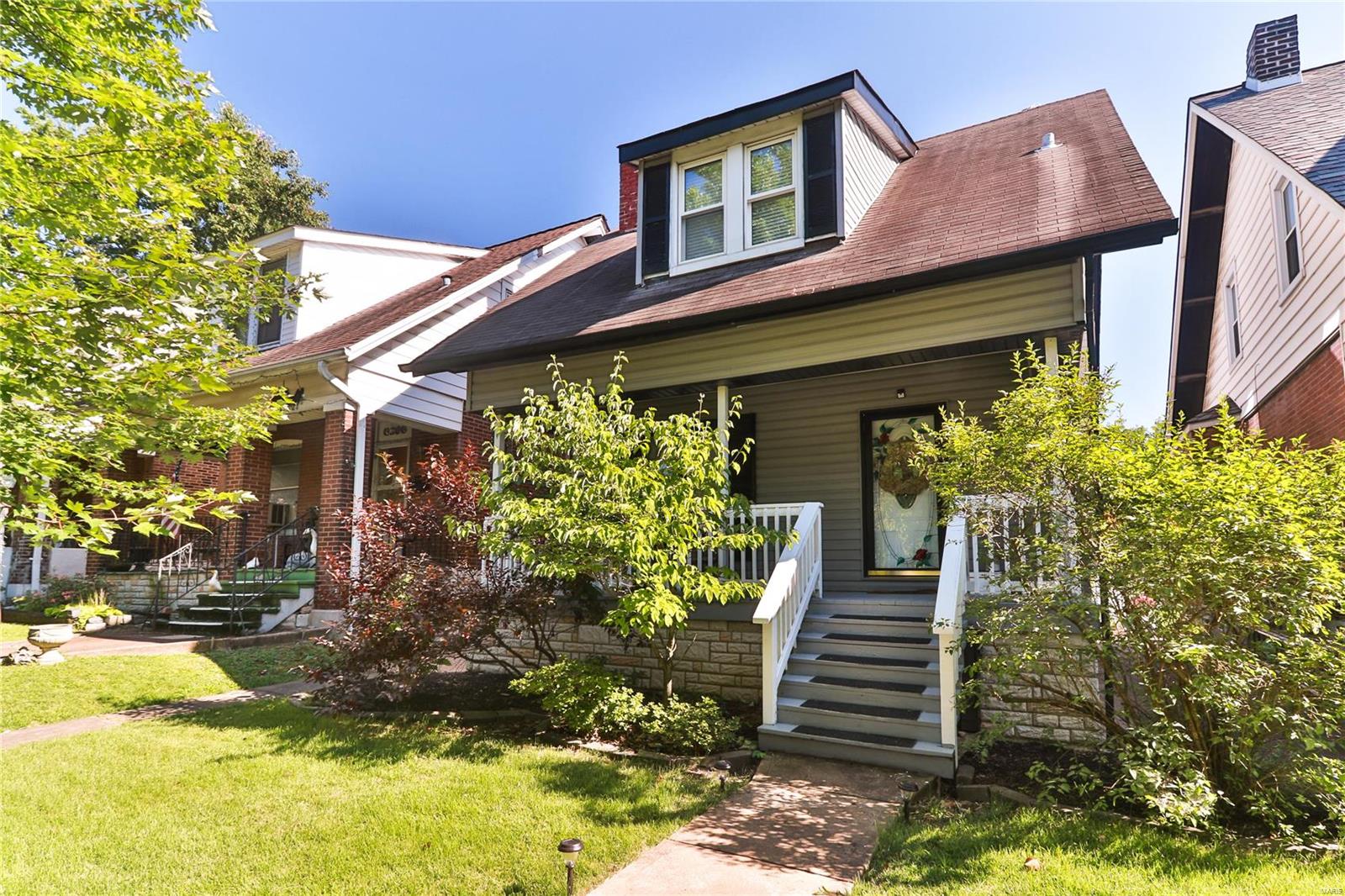 This home is Awesome, spacious & has the sweet charm you are looking for outside & in. Walk up the sidewalk and enjoy the large covered front porch. Go around back & notice the level, fenced yard, patio just waiting for a fire pit and friends, large parking pad & very nice deck. Enter into updates and space. Large entry foyer, side staircase to the upper level living & stained glass window. Continue on the wood floors to the updated kitchen. More than enough room to cook a great meal, and serve it casually at the breakfast bar, or sit down & take your time in the dining room. The dining/living room is Amazing with wood burning fireplace, vaulted ceiling, canned lighting & fresh, trending paint. Venture to the backyard through the french doors to the deck. The main bedroom is presently being used as a study. So many options for this room - and next to the main bedroom is a full bath!! Now lets go upstairs on the newer carpet and we find two more spacious bedrooms, & another full bath!