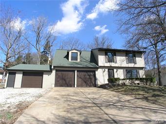 Looking for a beautiful home with a lake view? Enjoy swimming?  Want a great place to picnic and fish on Lake Tamarack? This Is It ! A beautiful 4 bedroom, 2 and 1/2 baths, a 3 plus car garage, open floor plan with an empty kitchen for you to design to "your choice". This home has been completely renovated "except for the kitchen of your dreams". The bathrooms are beautiful. Home has a newer roof, new windows,doors,flooring,A/C & furnace,doors siding,garage doors and all is freshly painted. There is also a main floor laundry. This Home Is A Must See! You won't be disappointed with this one!Seller will install new kitchen before closing.Seller wants buyer to pick out colors.This included stainless app Refrig,dishwasher,mirco and stove.
